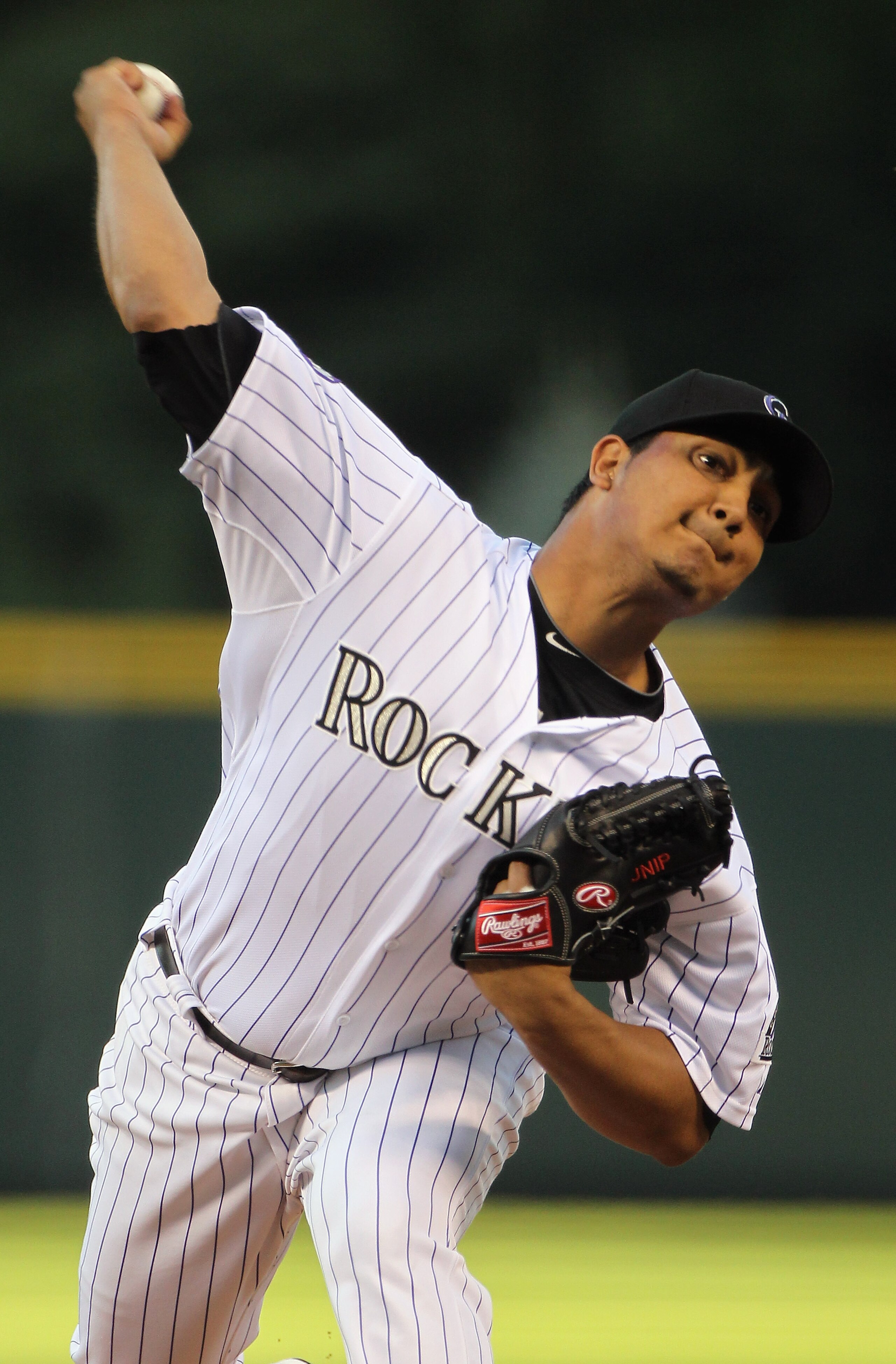 DENVER - SEPTEMBER 24:  Starting pitcher Jhoulys Chacin #45 of the Colorado Rockies delivers against the San Francisco Giants at Coors Field on September 24, 2010 in Denver, Colorado.  (Photo by Doug Pensinger/Getty Images)