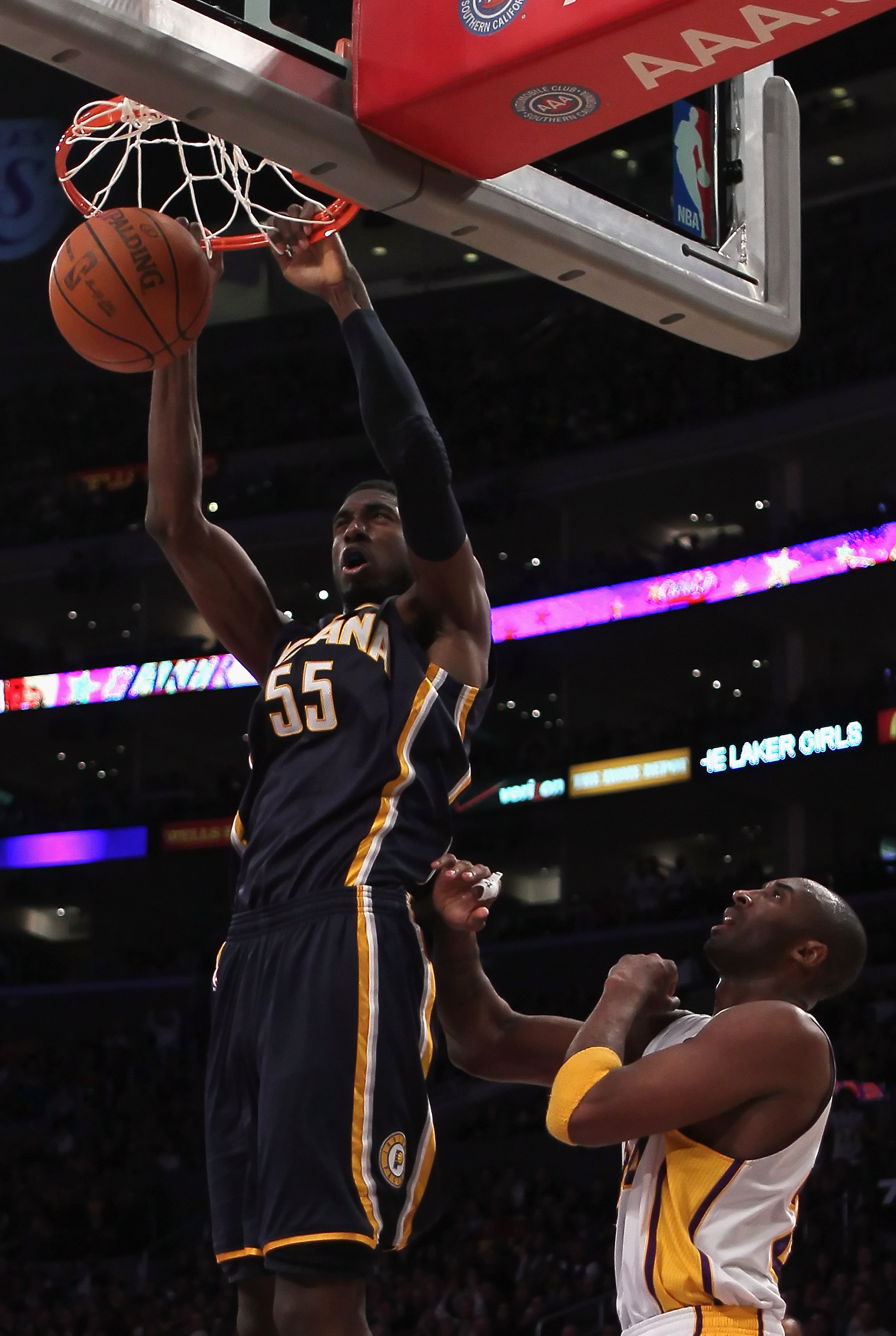 LOS ANGELES, CA - NOVEMBER 28:  Roy Hibbert #55 of the Indiana Pacers dunks the ball over Kobe Bryant #24 of the Los Angeles Lakers during the fourth quarter at Staples Center on November 28, 2010 in Los Angeles, California. The Pacers defeated the Lakers