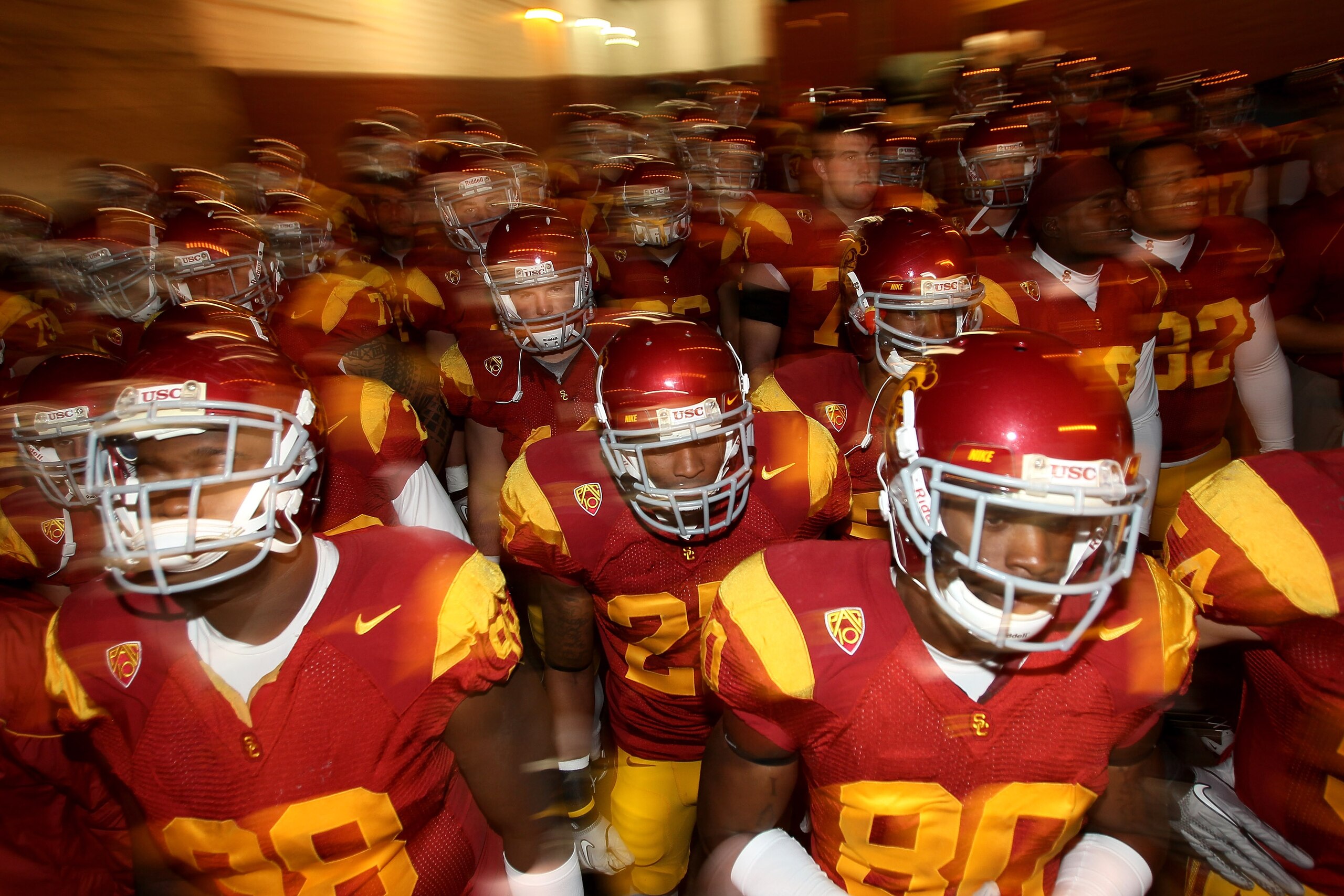 LOS ANGELES, CA - NOVEMBER 27: The USC Trojans come through the tunnel to the field before the game with the Notre Dame Fighting Irish at the Los Angeles Memorial Coliseum on November 27, 2010 in Los Angeles, California. Notre Dame won 20-16. (Photo by LOS ANGELES, CA - NOVEMBER 27: The USC Trojans come through the tunnel to the field before the game with the Notre Dame Fighting Irish at the Los Angeles Memorial Coliseum on November 27, 2010 in Los Angeles, California. Notre Dame won 20-16. (Photo by