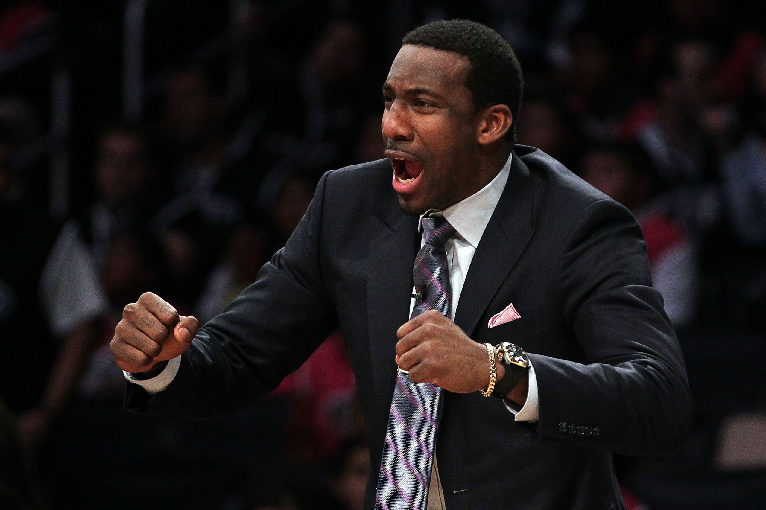 LOS ANGELES, CA - FEBRUARY 18:  Assistant coach Amare Stoudemire of the Rookie Team calls out from the bench during the T-Mobile Rookie Challenge and Youth Jam at Staples Center on February 18, 2011 in Los Angeles, California.  (Photo by Jeff Gross/Getty