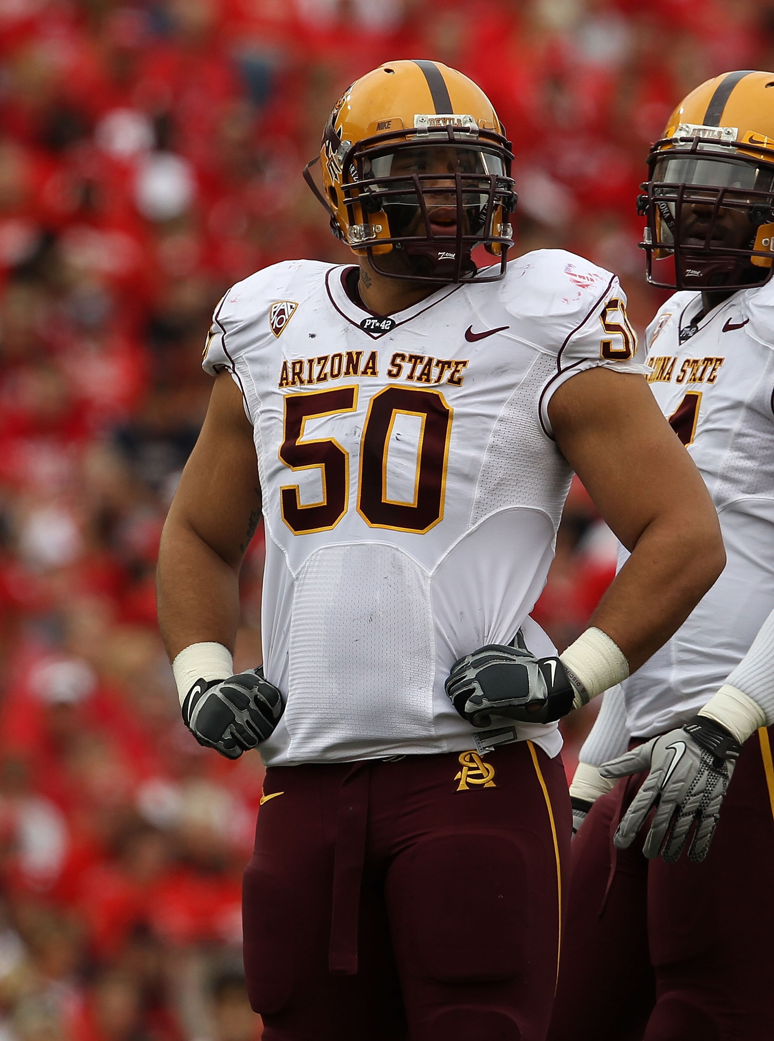 MADISON, WI - SEPTEMBER 18: Lawerence Guy #50 of the Arizona State Sun Devils waits during a time-out against the Wisconsin Badgers at Camp Randall Stadium on September 18, 2010 in Madison, Wisconsin. Wisconsin defeated Arizona State 20-19.  (Photo by Jon