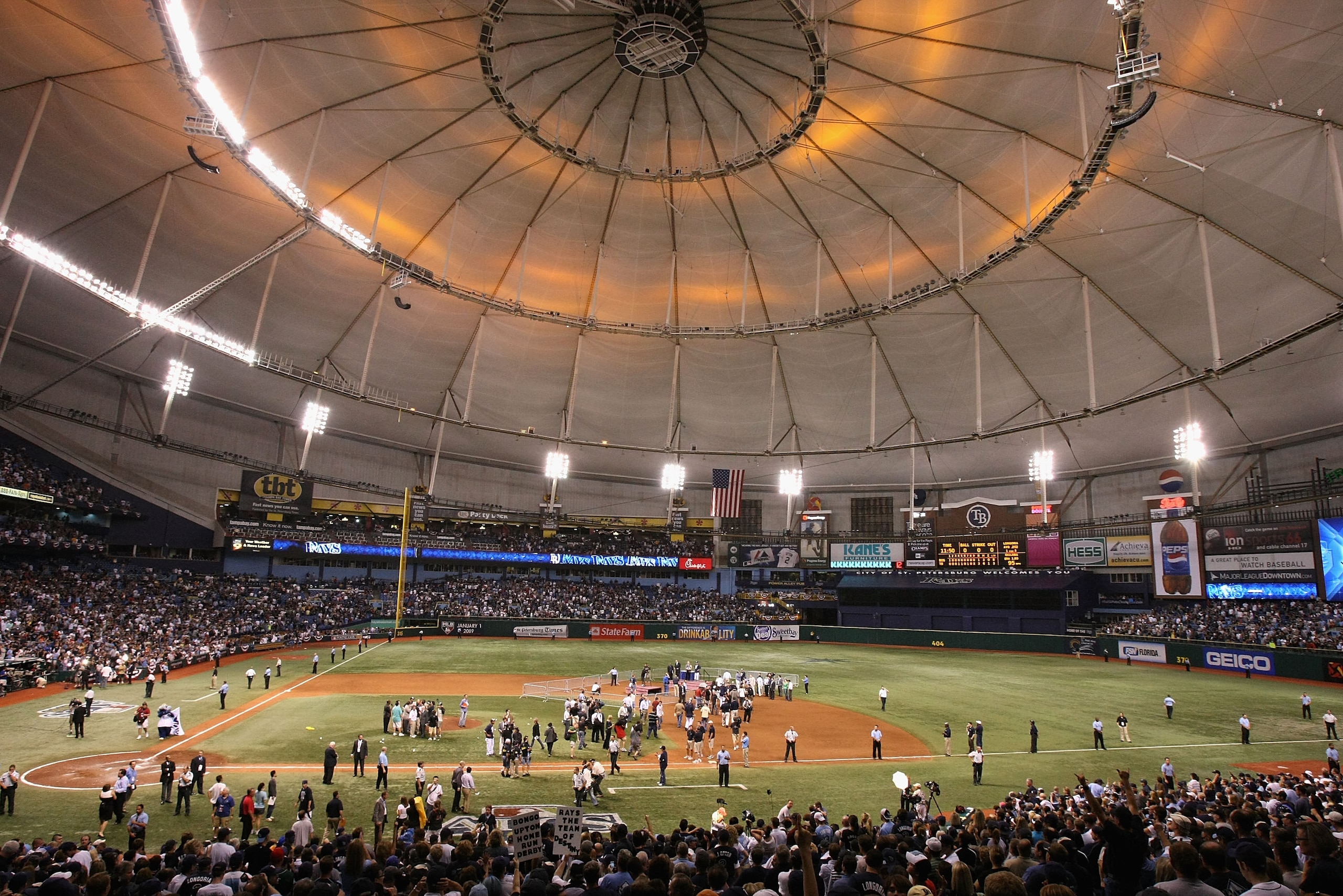 ST PETERSBURG, FL - OCTOBER 19: The Tampa Bay Rays celebrate after defeating the Boston Red Sox in game seven of the American League Championship Series during the 2008 MLB playoffs on October 19, 2008 at Tropicana Field in St Petersburg, Florida. The R ST PETERSBURG, FL - OCTOBER 19: The Tampa Bay Rays celebrate after defeating the Boston Red Sox in game seven of the American League Championship Series during the 2008 MLB playoffs on October 19, 2008 at Tropicana Field in St Petersburg, Florida. The R