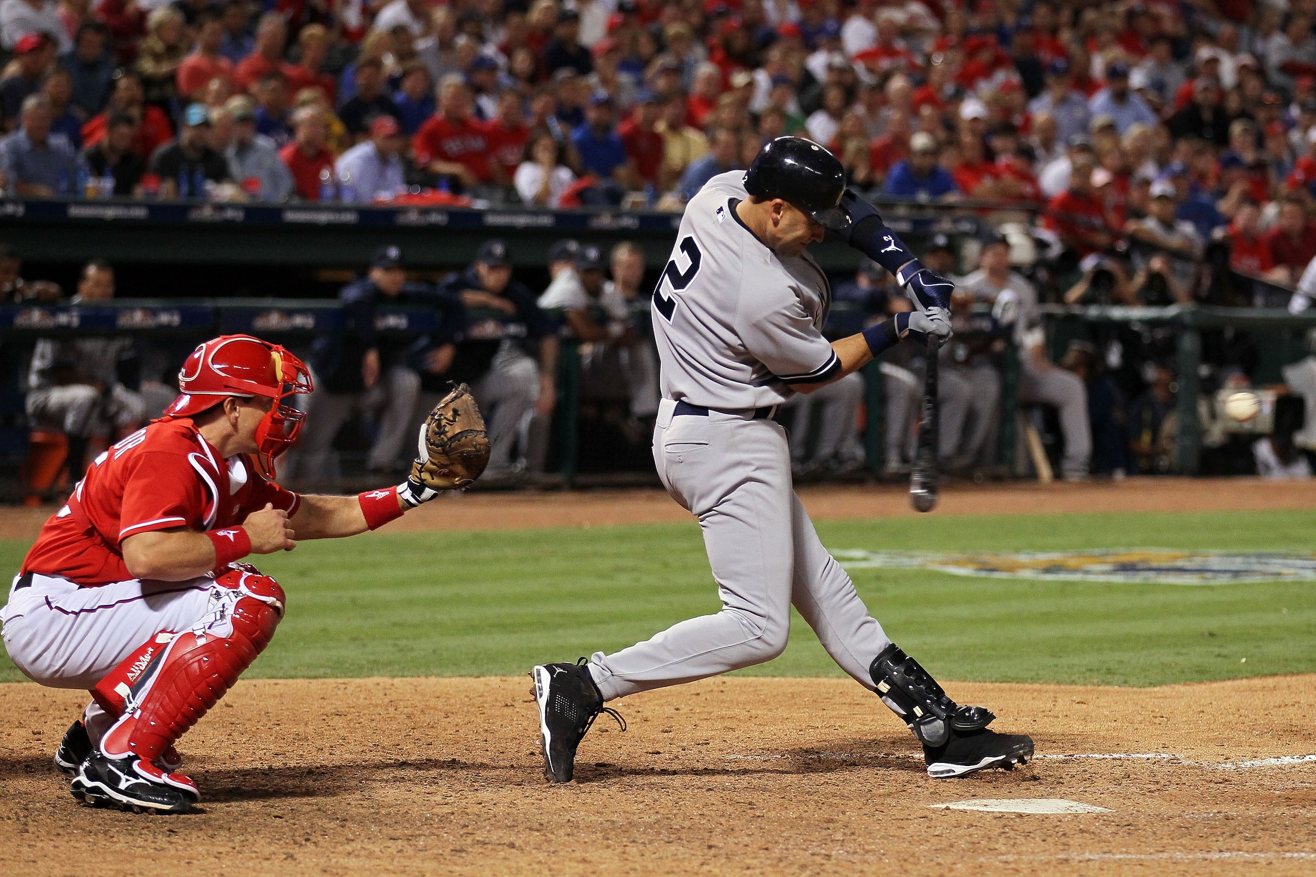 ARLINGTON, TX - OCTOBER 15:  Derek Jeter #2 of the New York Yankees hits a RBI double in the top of the eighth inning against the Texas Rangers in Game One of the ALCS during the 2010 MLB Playoffs at Rangers Ballpark in Arlington on October 15, 2010 in Ar