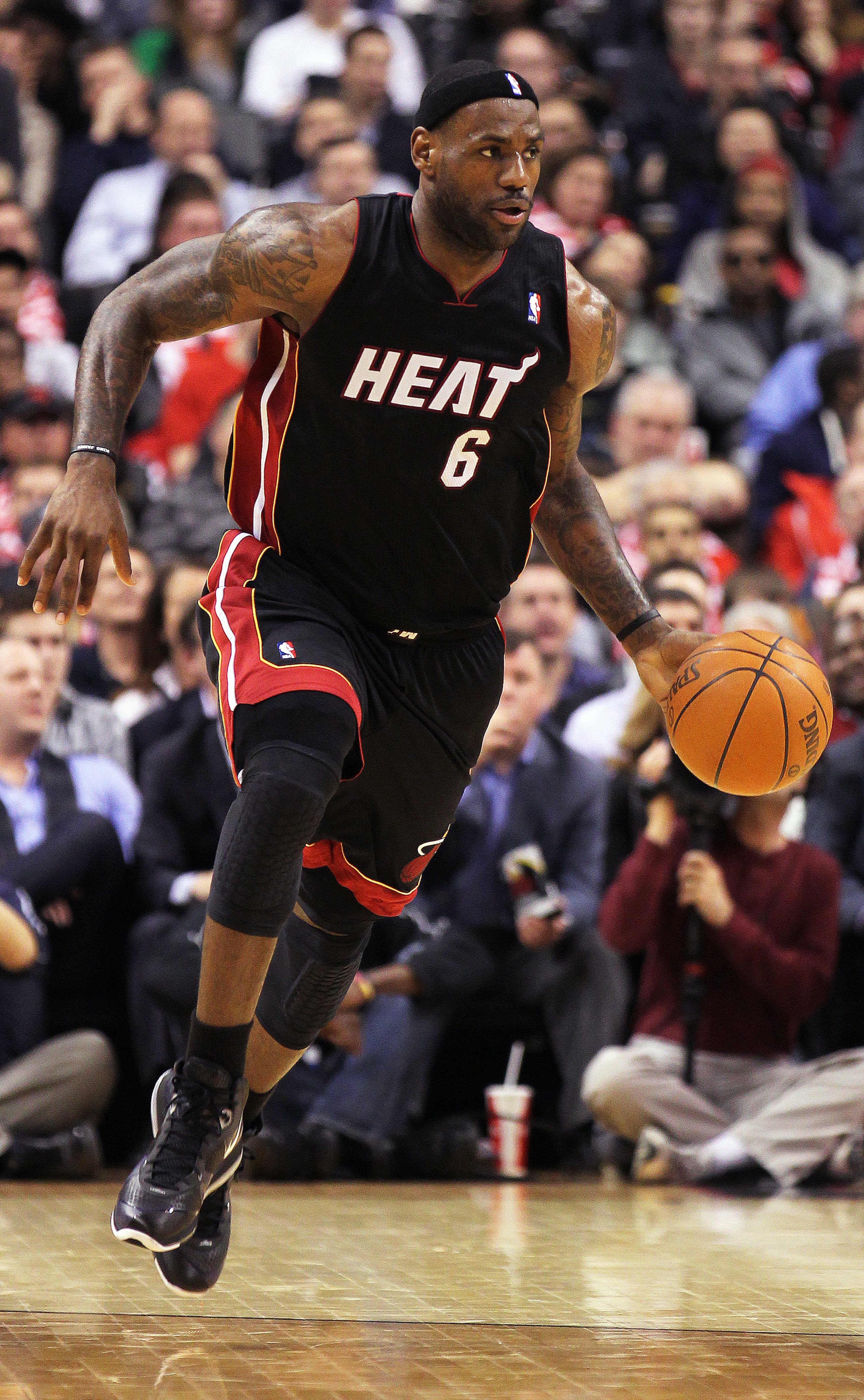 TORONTO, CANADA - FEBRUARY 16:  LeBron James #6 of the Miami Heat dribbles the ball up court in a game against the Toronto Raptors on February 16, 2011 at the Air Canada Centre in Toronto, Canada. The Heat defeated the Raptors 103-95. (Photo by Claus Ande