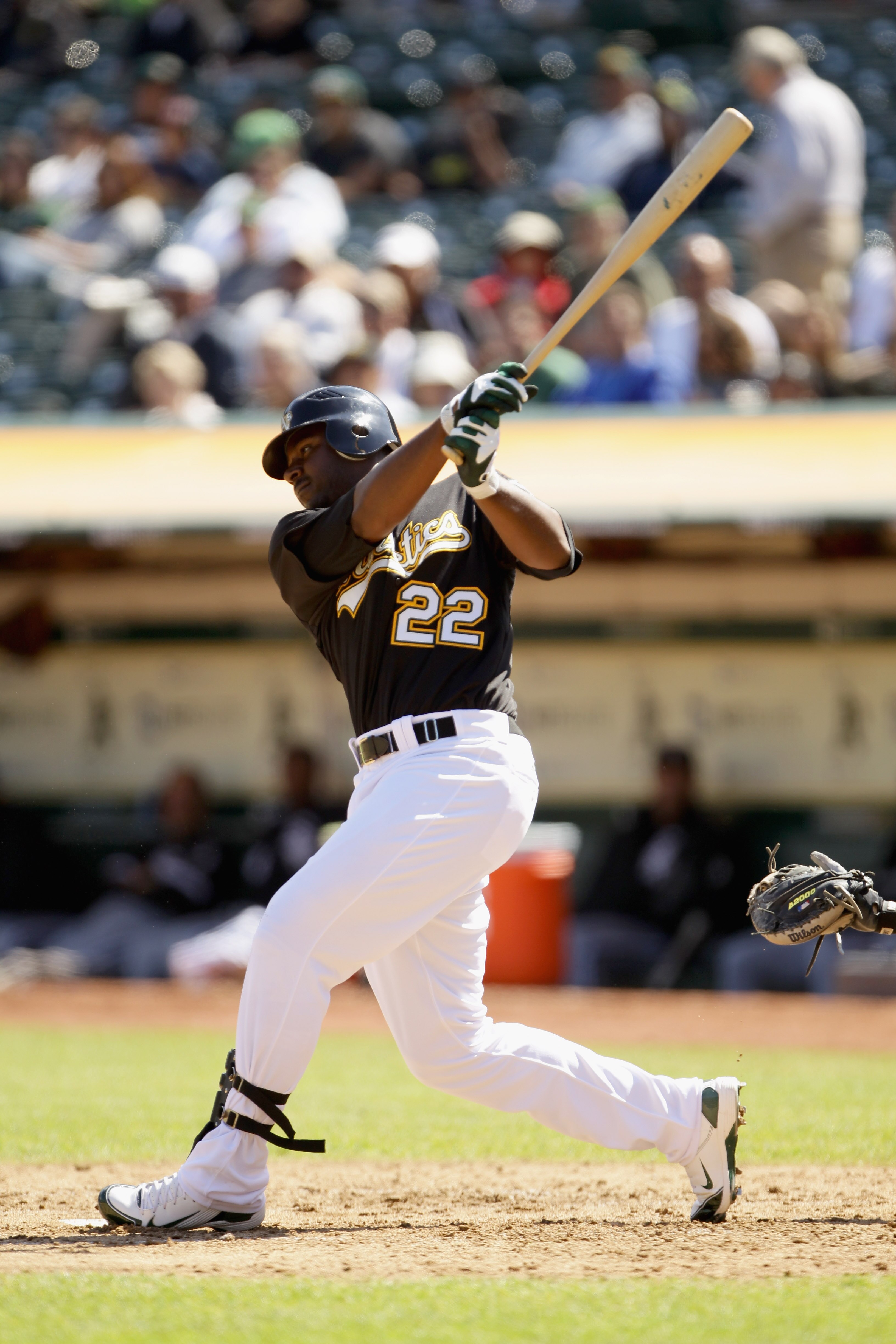 OAKLAND, CA - SEPTEMBER 22:  Chris Carter #22 of the Oakland Athletics bats against the Chicago White Sox at the Oakland-Alameda County Coliseum on September 22, 2010 in Oakland, California.  (Photo by Ezra Shaw/Getty Images)