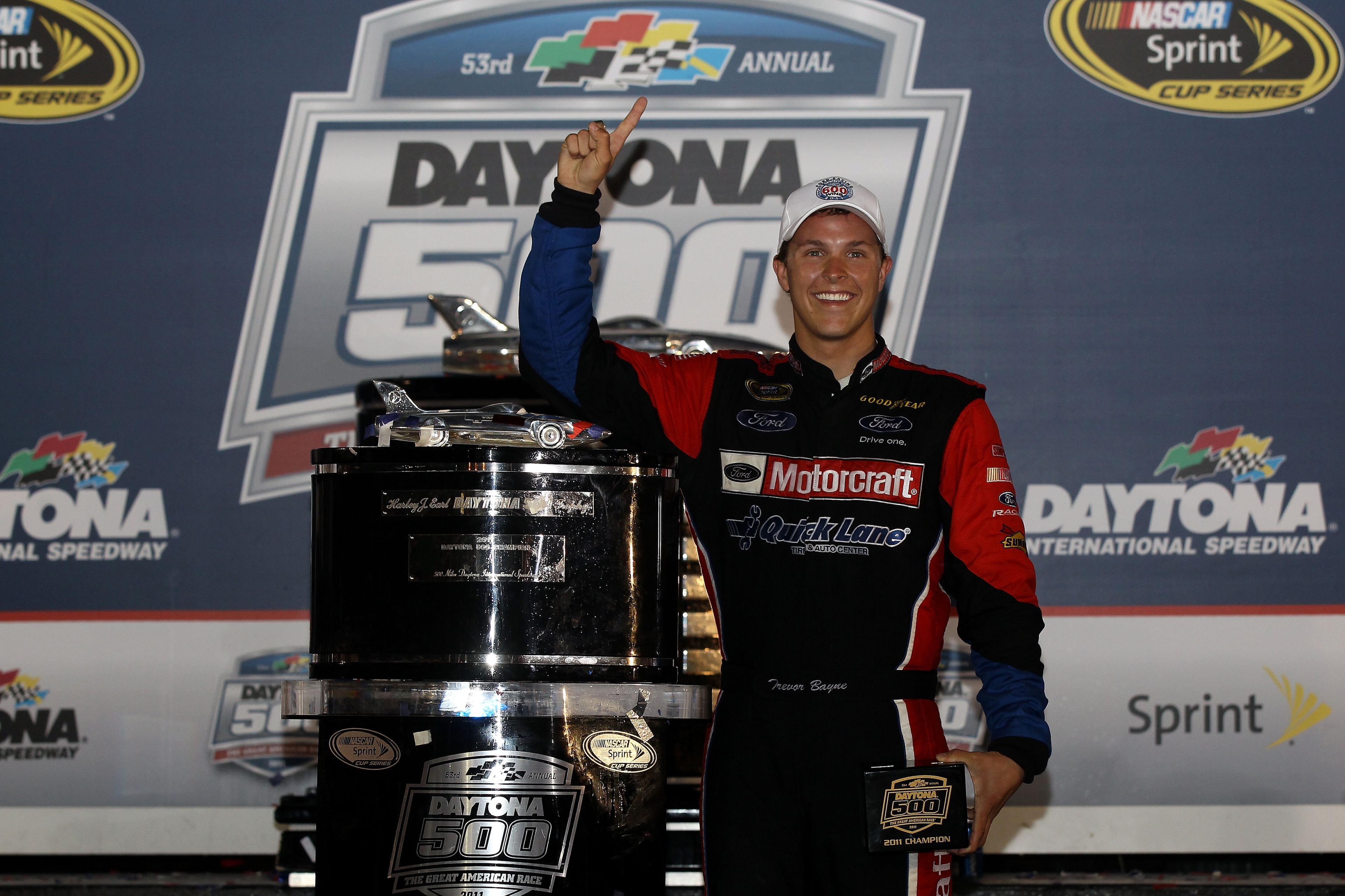 DAYTONA BEACH, FL - FEBRUARY 20: Trevor Bayne, driver of the #21 Motorcraft/Quick Lane Ford, celebrates with the Harley J. Earl Trophy after winning the NASCAR Sprint Cup Series Daytona 500 at Daytona International Speedway on February 20, 2011 in Dayton DAYTONA BEACH, FL - FEBRUARY 20: Trevor Bayne, driver of the #21 Motorcraft/Quick Lane Ford, celebrates with the Harley J. Earl Trophy after winning the NASCAR Sprint Cup Series Daytona 500 at Daytona International Speedway on February 20, 2011 in Dayton