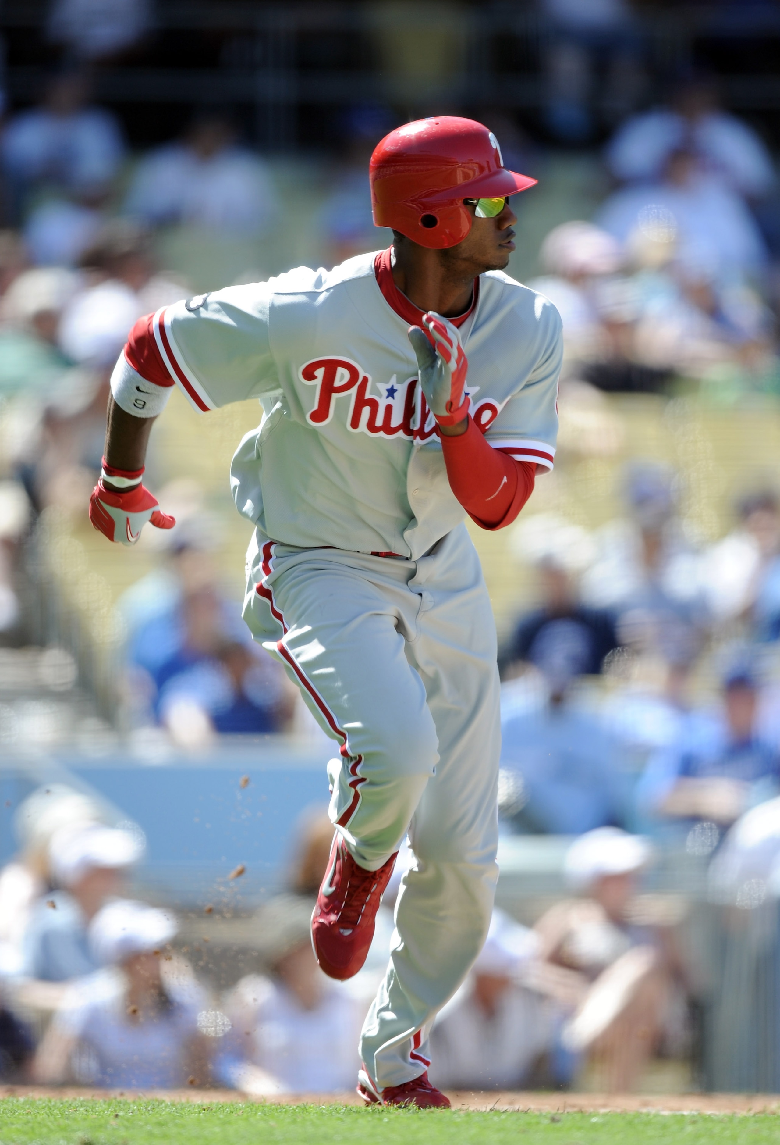 LOS ANGELES, CA - SEPTEMBER 01:  Dominic Brown #9 of the Philadelphia Phillies hits a double against the Los Angeles Dodgers at Dodger Stadium on September 1, 2010 in Los Angeles, California.  (Photo by Harry How/Getty Images)