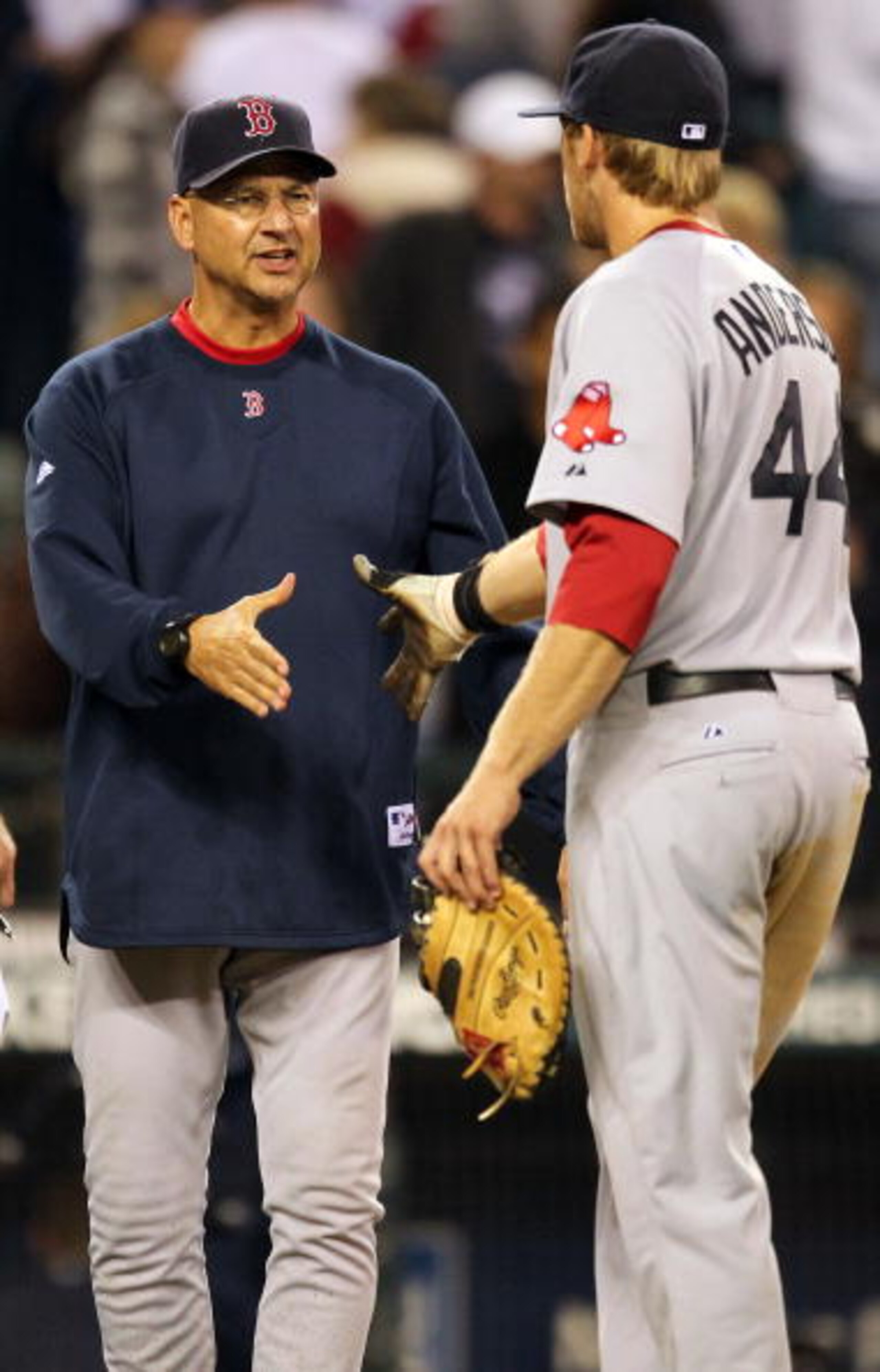 SEATTLE - SEPTEMBER 15: Manager Terry Francona #47 of the Boston Red Sox congratulates Lars Anderson #44 after defeating the Seattle Mariners 5-1 at Safeco Field on September 15, 2010 in Seattle, Washington. (Photo by Otto Greule Jr/Getty Images) SEATTLE - SEPTEMBER 15: Manager Terry Francona #47 of the Boston Red Sox congratulates Lars Anderson #44 after defeating the Seattle Mariners 5-1 at Safeco Field on September 15, 2010 in Seattle, Washington. (Photo by Otto Greule Jr/Getty Images)