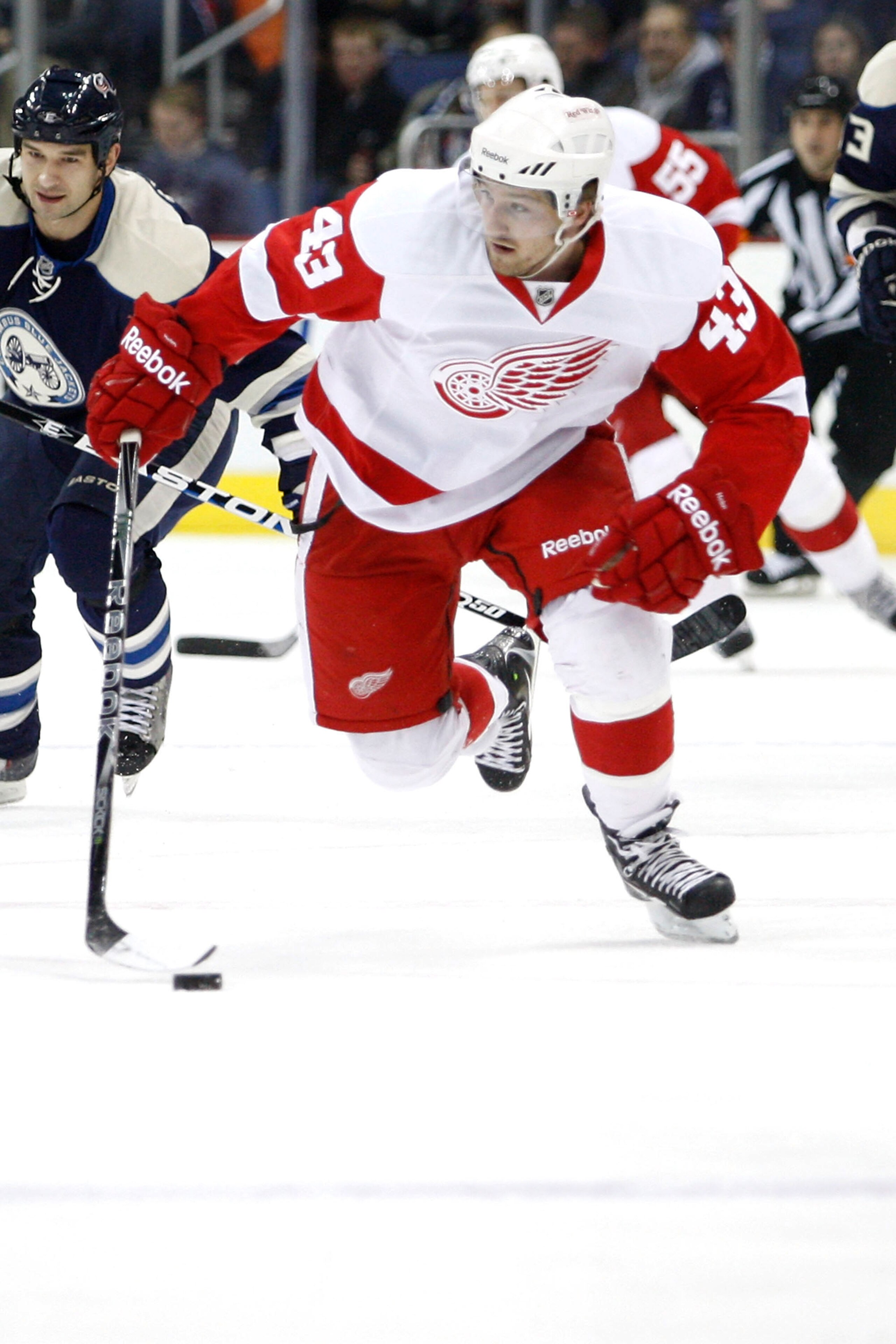 COLUMBUS, OH - JANUARY 14: Darren Helm #43 of the Detroit Red Wings skates the puck up ice against the Columbus Blue Jackets on January 14, 2011 at Nationwide Arena in Columbus, Ohio. (Photo by John Grieshop/Getty Images) COLUMBUS, OH - JANUARY 14: Darren Helm #43 of the Detroit Red Wings skates the puck up ice against the Columbus Blue Jackets on January 14, 2011 at Nationwide Arena in Columbus, Ohio. (Photo by John Grieshop/Getty Images)