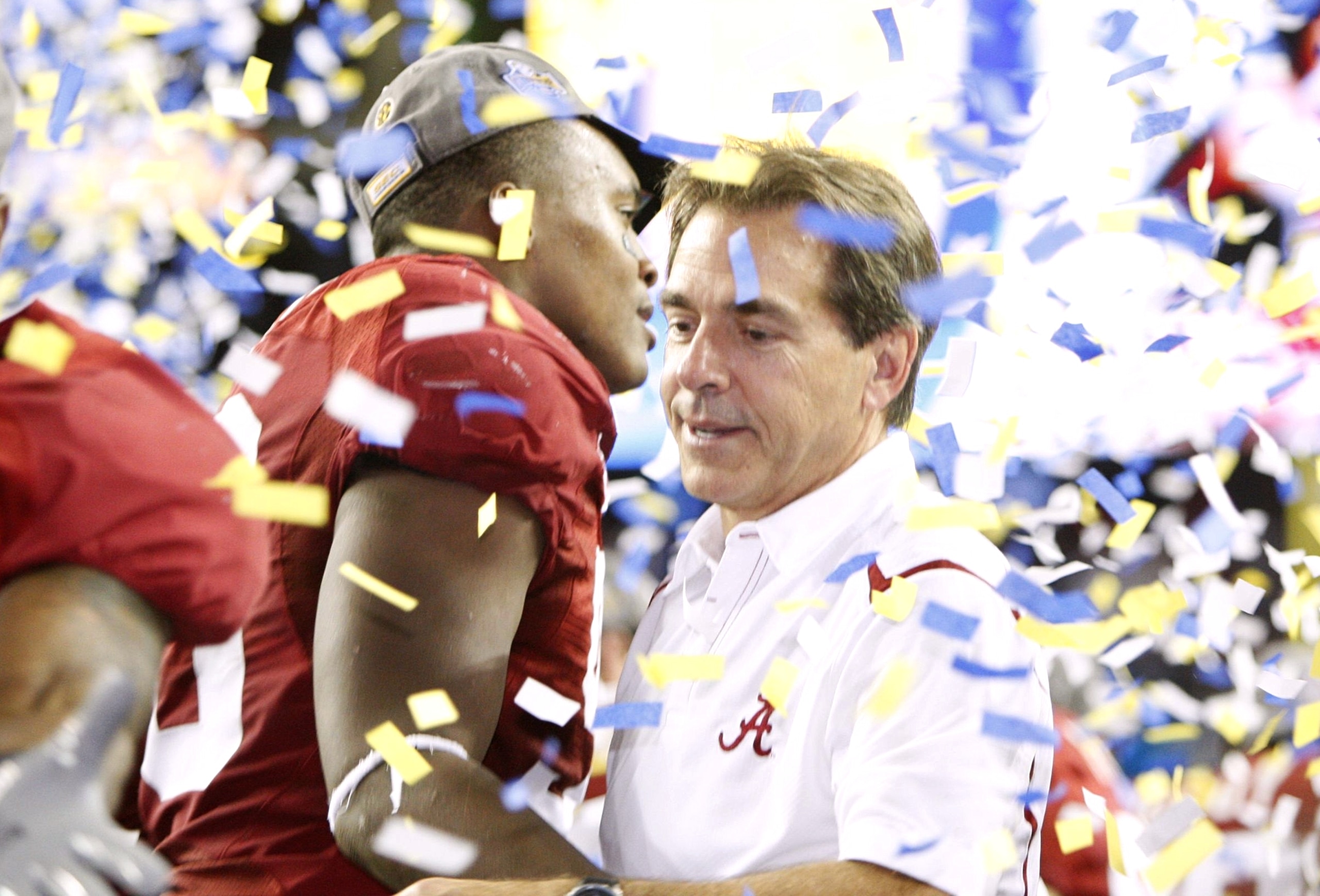 ATLANTA - DECEMBER 5: Head coach Nick Saban of the Alabama Crimson Tide celebrates with his players after their 32-13 win against the Florida Gators during the SEC Championship game at Georgia Dome on December 5, 2009 in Atlanta, Georgia. (Photo by Kevi ATLANTA - DECEMBER 5: Head coach Nick Saban of the Alabama Crimson Tide celebrates with his players after their 32-13 win against the Florida Gators during the SEC Championship game at Georgia Dome on December 5, 2009 in Atlanta, Georgia. (Photo by Kevi