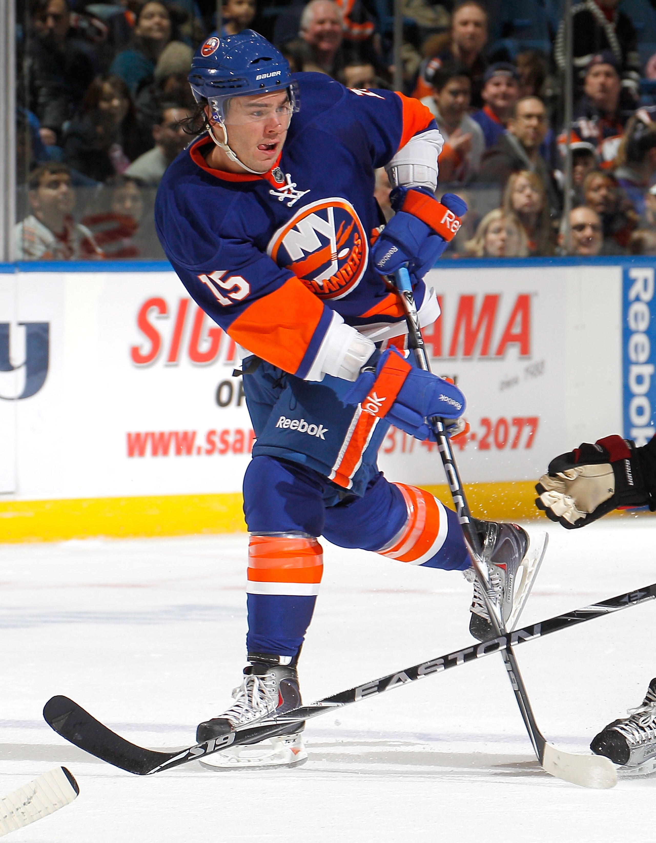 UNIONDALE, NY - FEBRUARY 05: PA Parenteau #15 of the New York Islanders passes during an NHL hockey game against the Ottawa Senators at Nassau Coliseum on February 5, 2011 in Uniondale, New York. (Photo by Paul Bereswill/Getty Images) UNIONDALE, NY - FEBRUARY 05: PA Parenteau #15 of the New York Islanders passes during an NHL hockey game against the Ottawa Senators at Nassau Coliseum on February 5, 2011 in Uniondale, New York. (Photo by Paul Bereswill/Getty Images)