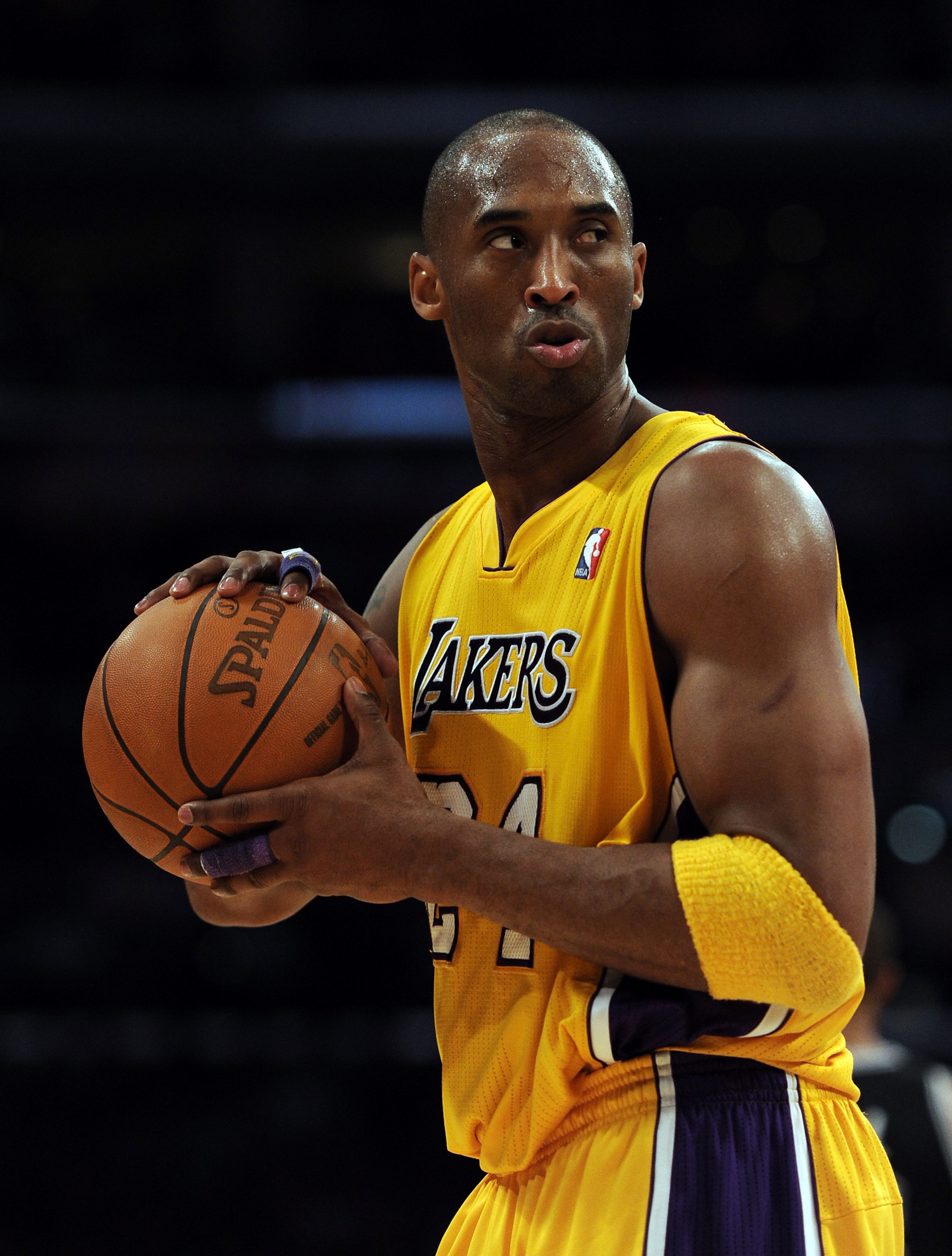 LOS ANGELES, CA - FEBRUARY 03:  Kobe Bryant #24 of the Los Angeles Lakers reacts to his defense during a stop in play against the San Antonio Spurs during the first half at Staples Center on February 3, 2011 in Los Angeles, California.  NOTE TO USER: User