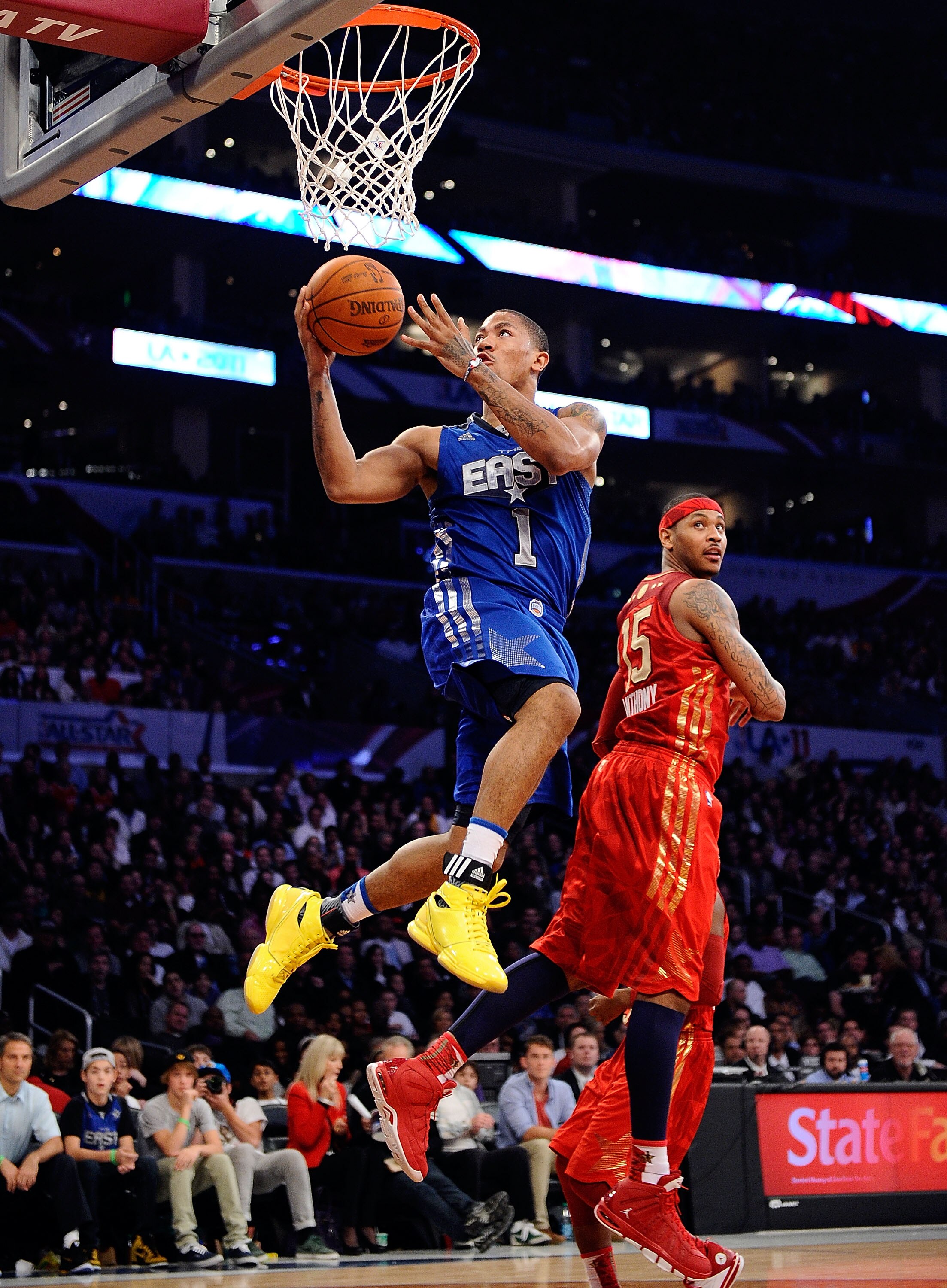 LOS ANGELES, CA - FEBRUARY 20:  Derrick Rose #1 of the Chicago Bulls and the Eastern Conference goes up for a shot past Carmelo Anthony #15 of the Denver Nuggets and the Western Conference in the 2011 NBA All-Star Game at Staples Center on February 20, 20