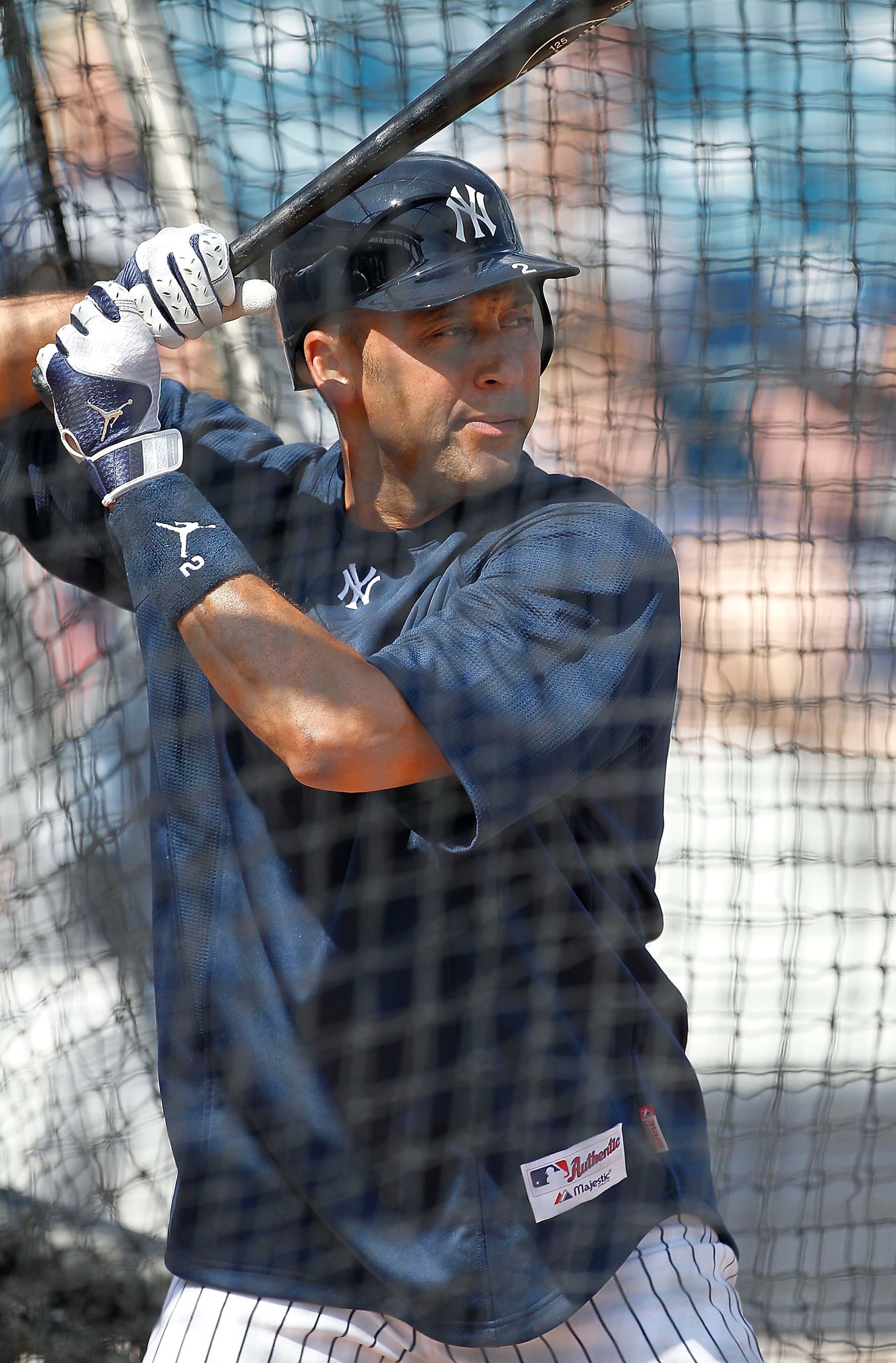 TAMPA, FL - FEBRUARY 20:  Derek Jeter #2 of the New York Yankees takes batting practice during the first full team workout of Spring Training on February 20, 2011 at the George M. Steinbrenner Field in Tampa, Florida.  (Photo by Leon Halip/Getty Images)