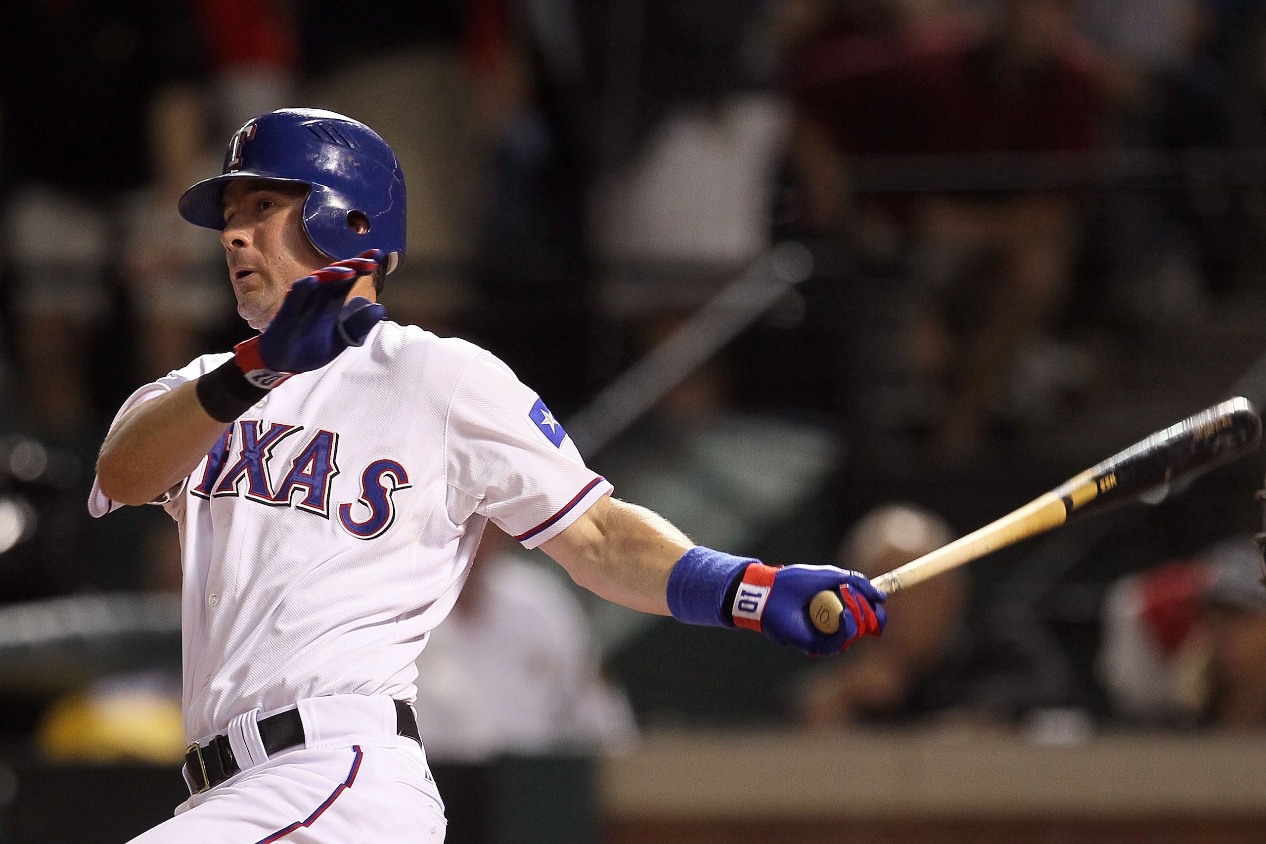 ARLINGTON, TX - OCTOBER 22:  Michael Young #10 of the Texas Rangers hits a double in the seventh inning against the New York Yankees in Game Six of the ALCS during the 2010 MLB Playoffs at Rangers Ballpark in Arlington on October 22, 2010 in Arlington, Te