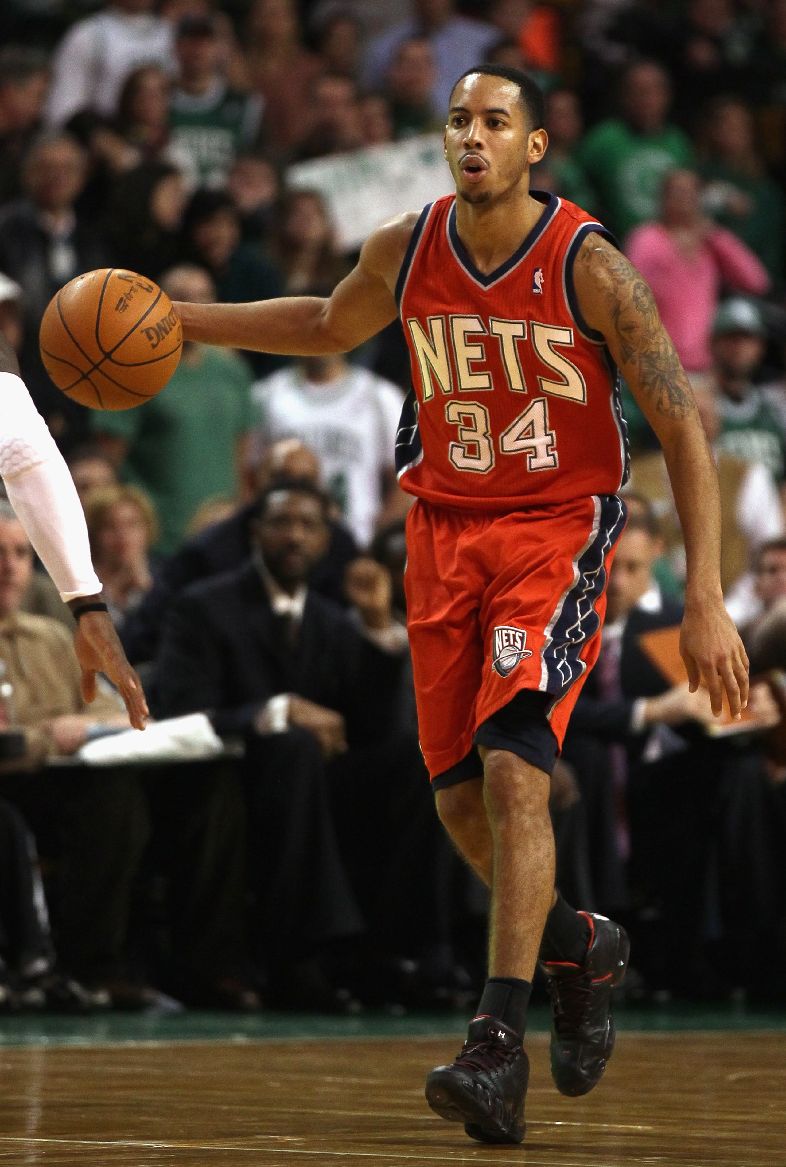 BOSTON - NOVEMBER 24:  Devin Harries #34 of the New Jersey Nets takes the ball up the court in the second half against the Boston Celtics on November 24, 2010 at the TD Garden in Boston, Massachusetts. The Celtics defeated the nets 89-83. NOTE TO USER: Us
