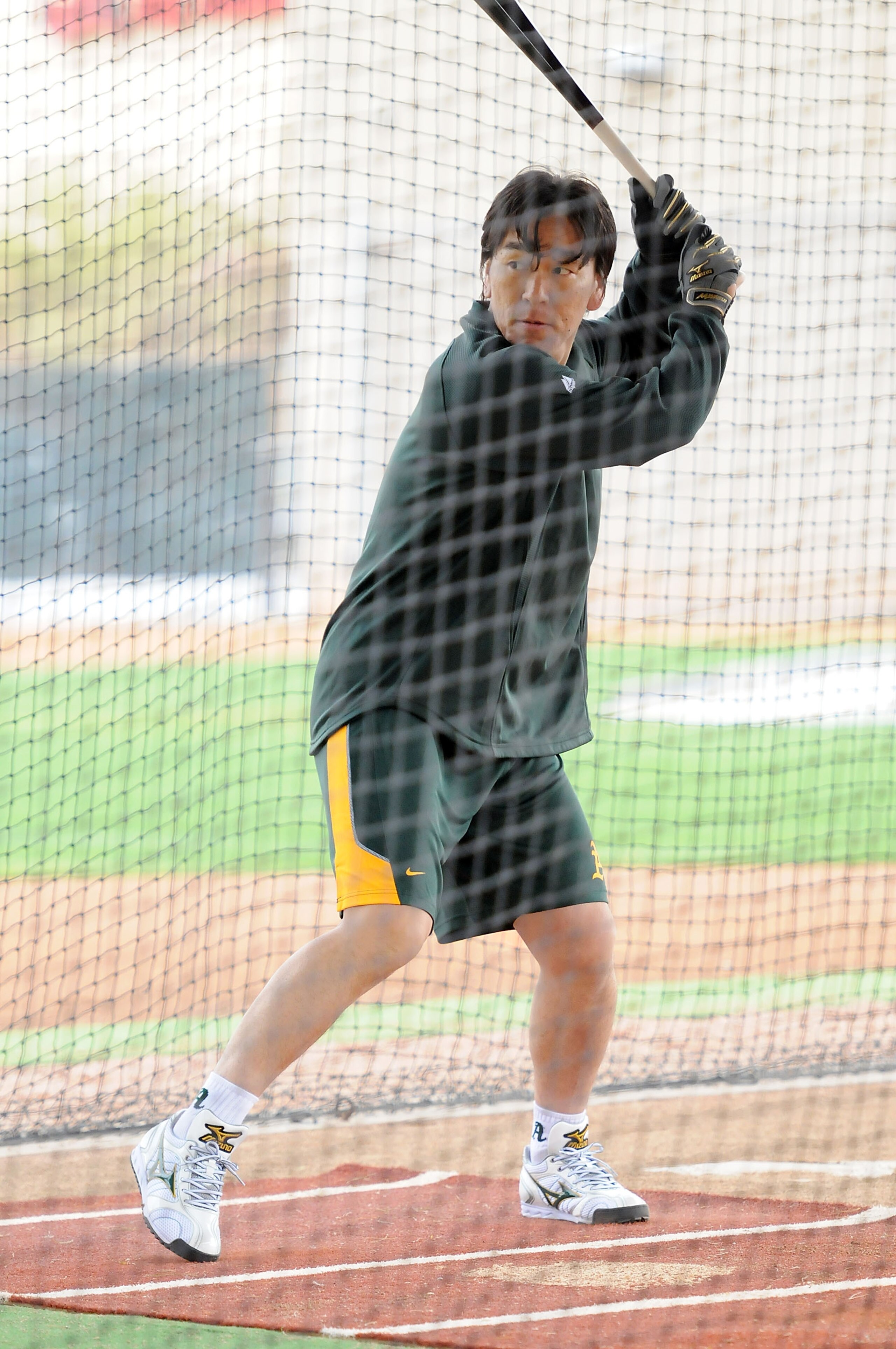 PHOENIX, AZ - FEBRUARY 20:  Hideki Matsui #55 of the Oakland Athletics takes batting practice during spring work outs at Phoenix Municipal Stadium on February 20, 2011 in Phoenix, Arizona.  (Photo by Norm Hall/Getty Images)