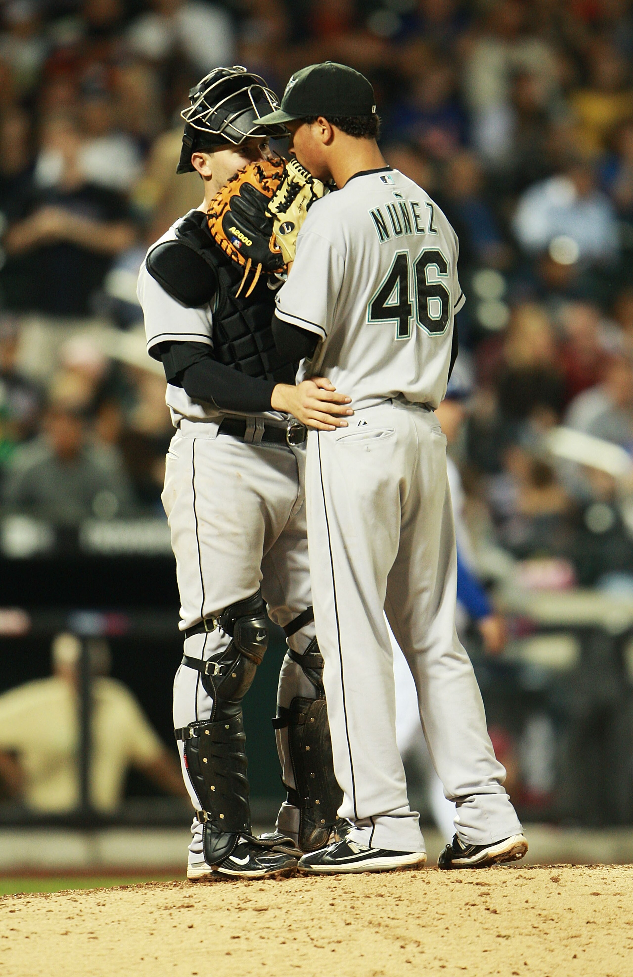 NEW YORK - AUGUST 25:  Leo Nunez #46 (R) of the Florida Marlins talks with Brett Hayes #9 during the ninth inning against the New York Mets on August 25, 2010 at Citi Field in the Flushing neighborhood of the Queens borough of New York City. The Marlins b
