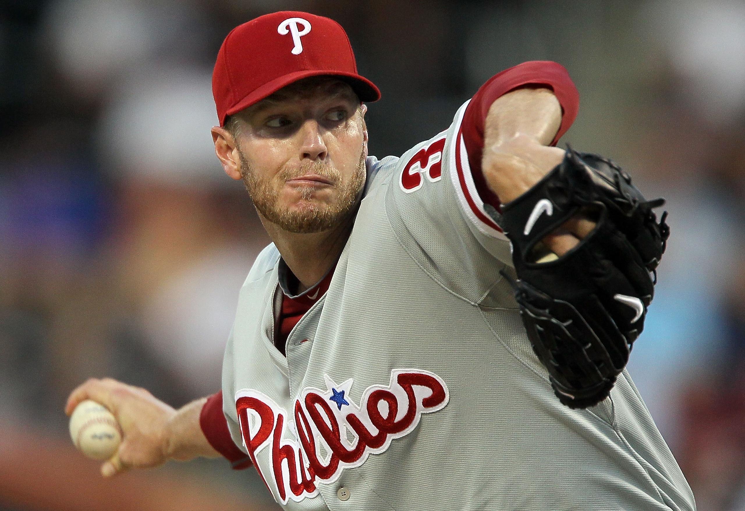 NEW YORK - AUGUST 14:  Roy Halladay #34 of the Philadelphia Phillies delivers a pitch against the New York Mets on August 14, 2010 at Citi Field in the Flushing neighborhood of the Queens borough of New York City.  (Photo by Jim McIsaac/Getty Images)