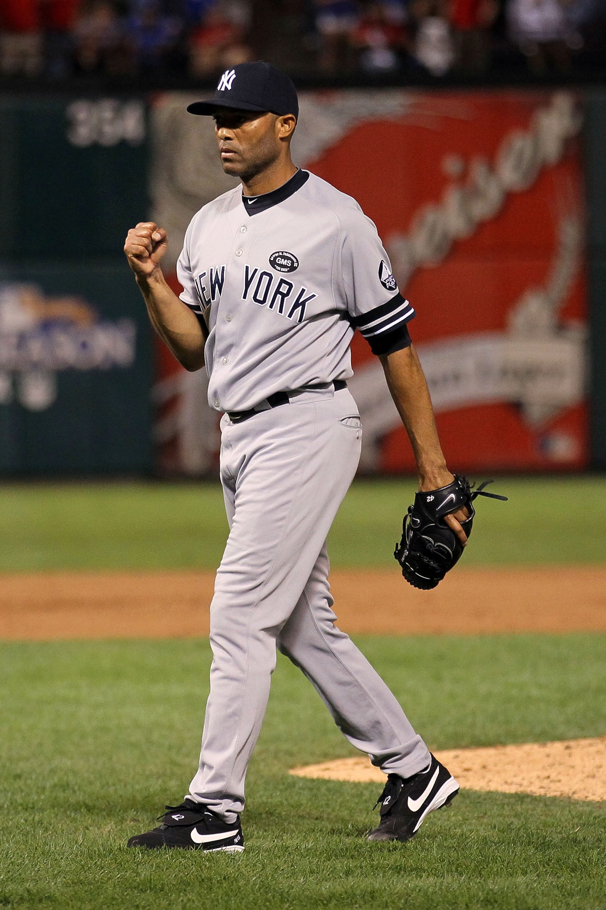 ARLINGTON, TX - OCTOBER 15:  Mariano Rivera #42 of the New York Yankees celebrates after defeating the Texas Rangers by a score of 6-5 to win Game One of the ALCS during the 2010 MLB Playoffs at Rangers Ballpark in Arlington on October 15, 2010 in Arlingt