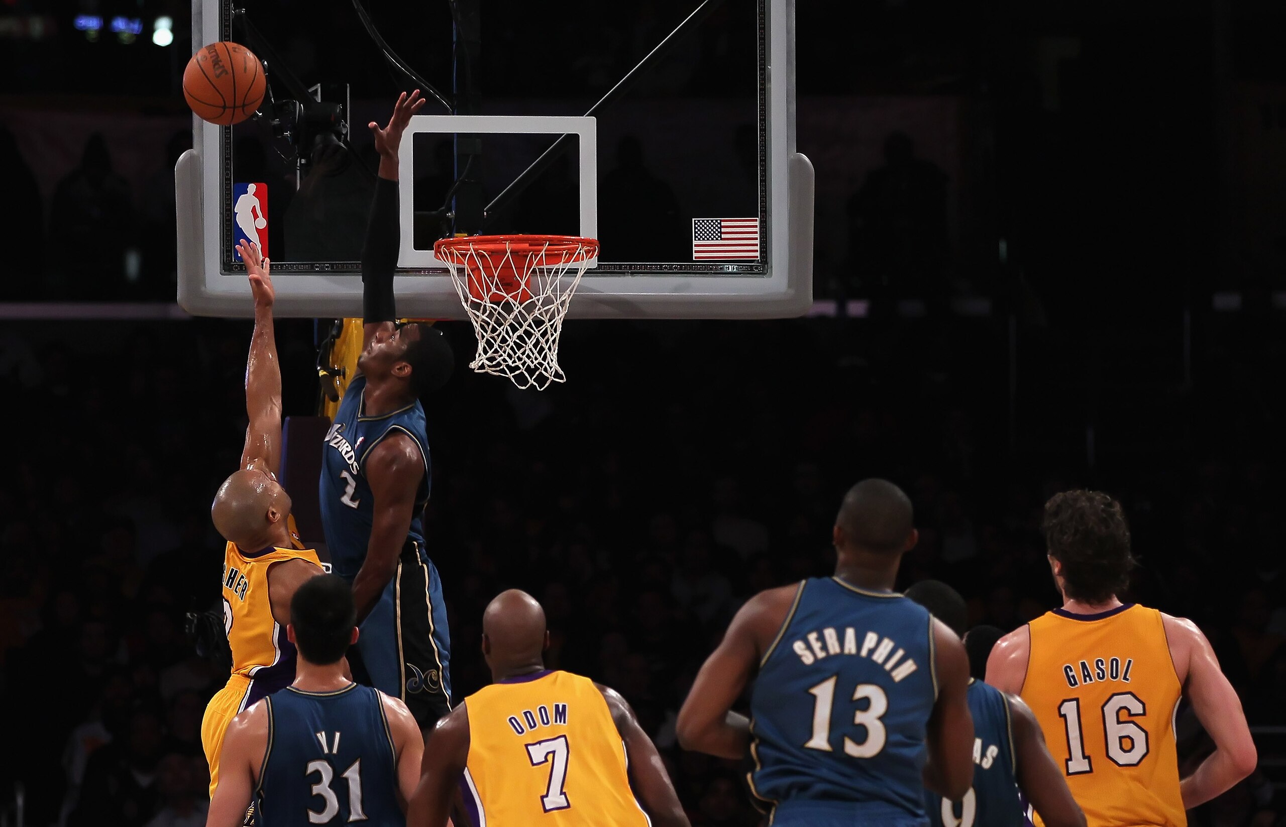 LOS ANGELES, CA - DECEMBER 07: John Wall #2 of the Washington Wizards blocks a shot by Derek Fisher (L) #2 of the Los Angeles Lakers in the second half at Staples Center on December 7, 2010 in Los Angeles, California. The Lakers defeated the Wizards 115- LOS ANGELES, CA - DECEMBER 07: John Wall #2 of the Washington Wizards blocks a shot by Derek Fisher (L) #2 of the Los Angeles Lakers in the second half at Staples Center on December 7, 2010 in Los Angeles, California. The Lakers defeated the Wizards 115-