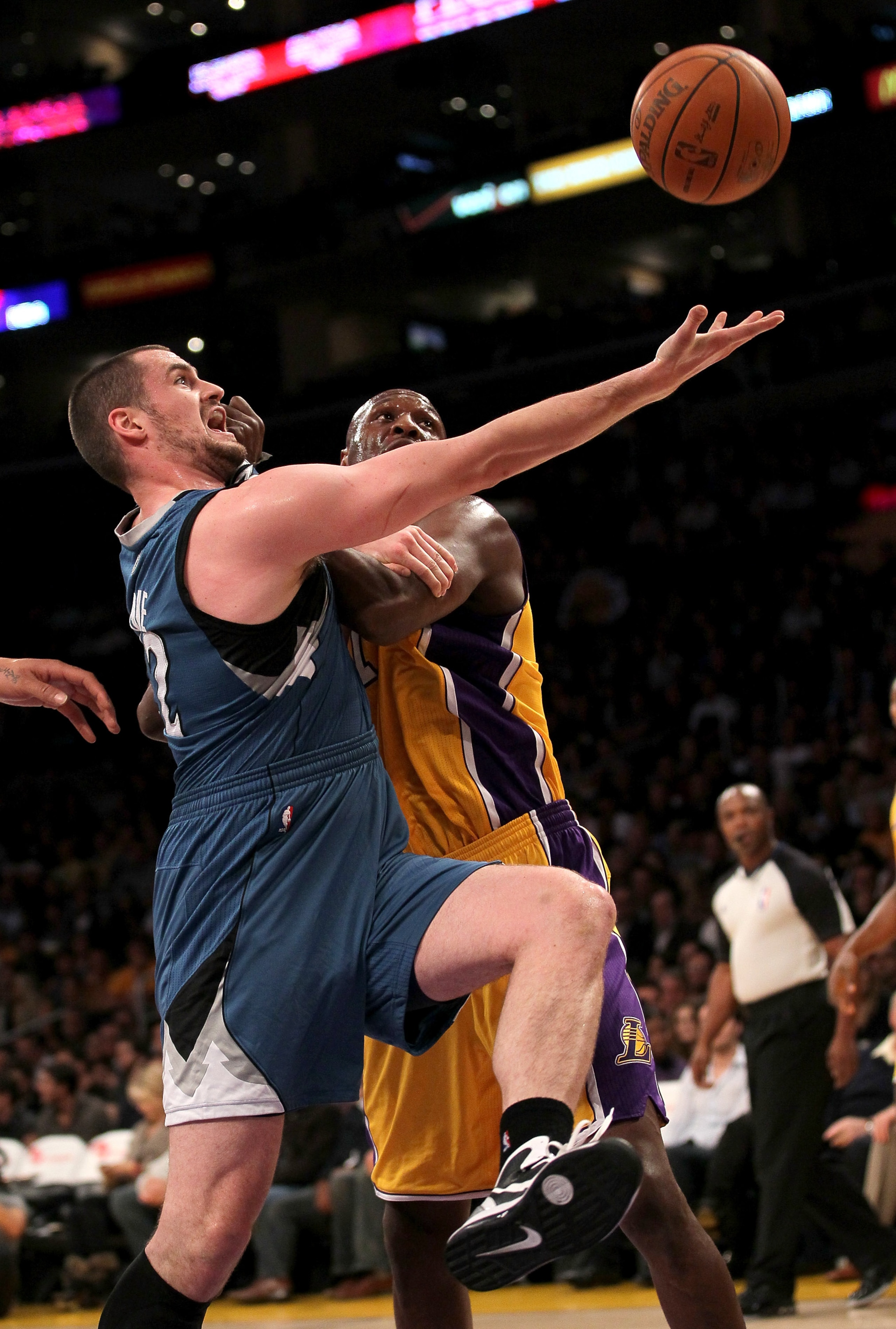 LOS ANGELES - NOVEMBER 9: Kevin Love #42 of the Minnesota Timberwolves battles for a rebound with Lamar Odom #7 of the Los Angeles Lakers at Staples Center on November 9, 2010 in Los Angeles, California. NOTE TO USER: User expressly acknowledges and ag LOS ANGELES - NOVEMBER 9: Kevin Love #42 of the Minnesota Timberwolves battles for a rebound with Lamar Odom #7 of the Los Angeles Lakers at Staples Center on November 9, 2010 in Los Angeles, California. NOTE TO USER: User expressly acknowledges and ag