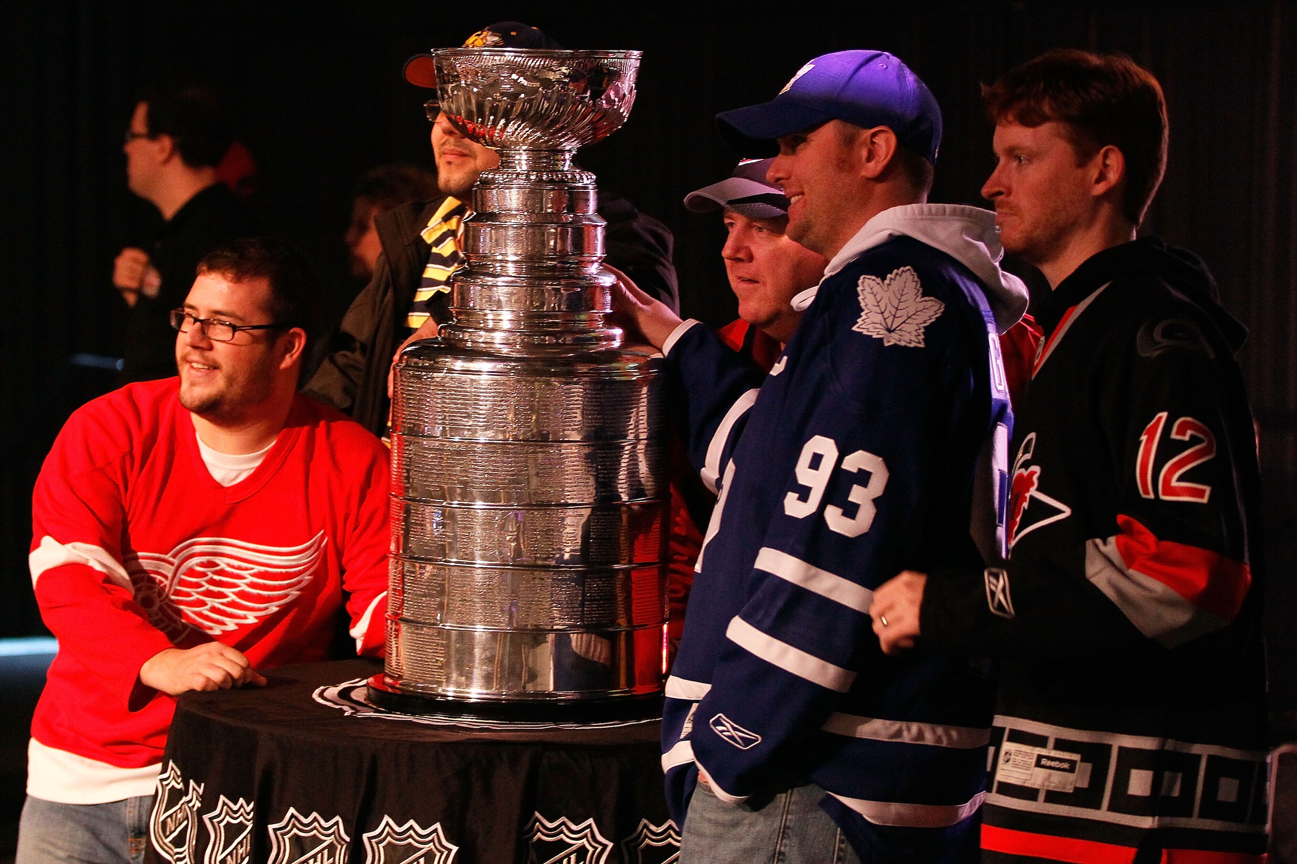 RALEIGH, NC - JANUARY 28:  Hockey fans pose with the Stanley Cup inside the NHL Fan Fair part of 2011 NHL All-Star Weekend at the Raleigh Convention Center on January 28, 2011 in Raleigh, North Carolina.  (Photo by Kevin C. Cox/Getty Images)