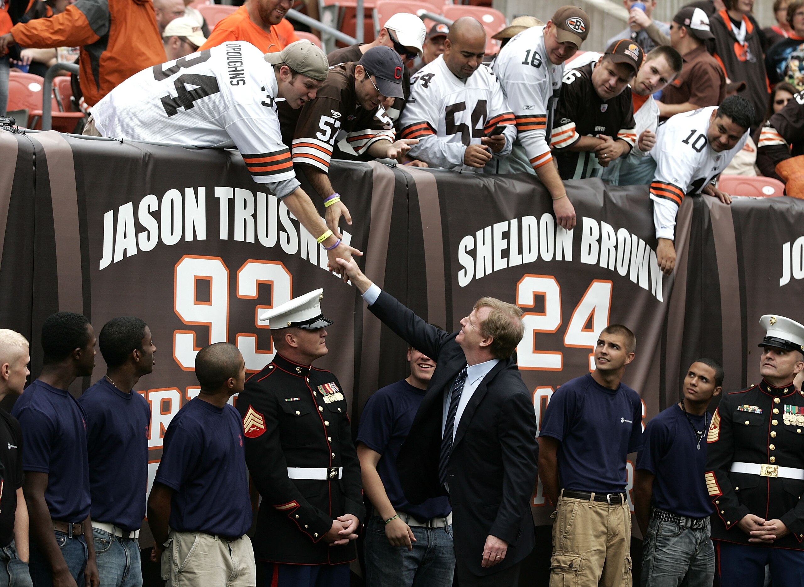 CLEVELAND - SEPTEMBER 19:  Roger Goodell, Commissioner of the NFL, shakes hands with fans before the start of the Kansas City Chiefs versus Clevelnd Browns game at Cleveland Browns Stadium on September 19, 2010 in Cleveland, Ohio.  (Photo by Matt Sullivan