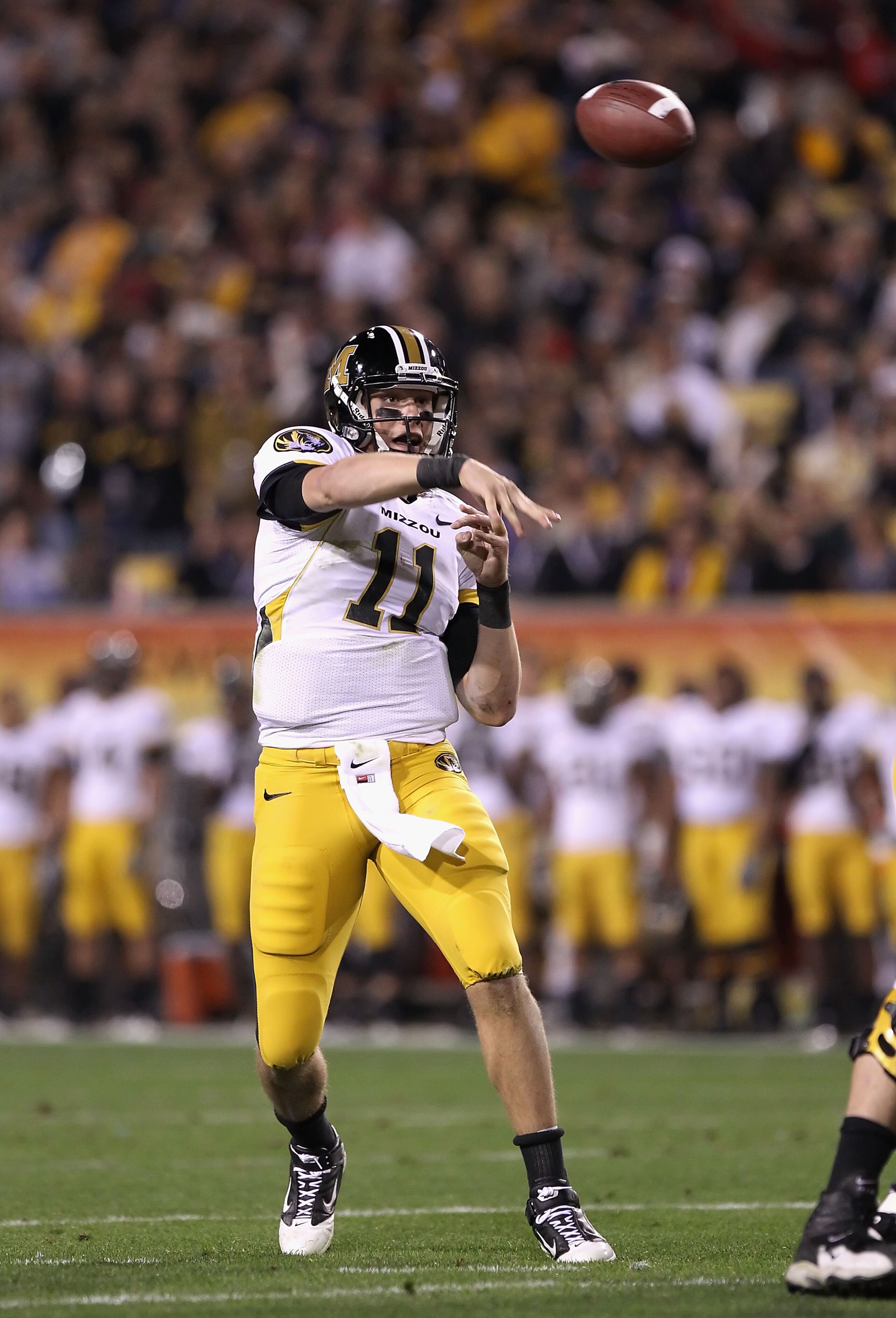 TEMPE, AZ - DECEMBER 28:  Quarterback Blaine Gabbert #11 of the Missouri Tigers throws a pass during the Insight Bowl against the Iowa Hawkeyes at Sun Devil Stadium on December 28, 2010 in Tempe, Arizona.  (Photo by Christian Petersen/Getty Images)