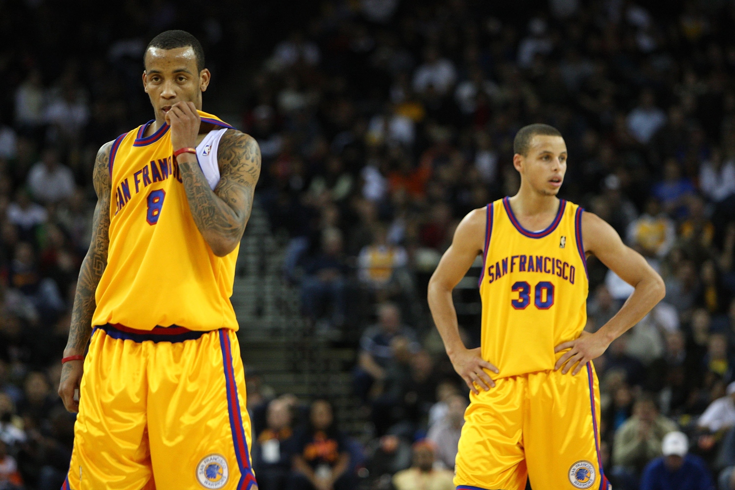 OAKLAND, CA - DECEMBER 03: Stephen Curry #30 and Monta Ellis #8 of the Golden State Warriors look on near the end of the game against the Houston Rockets during an NBA game at Oracle Arena on December 3, 2009 in Oakland, California. NOTE TO USER: User ex OAKLAND, CA - DECEMBER 03: Stephen Curry #30 and Monta Ellis #8 of the Golden State Warriors look on near the end of the game against the Houston Rockets during an NBA game at Oracle Arena on December 3, 2009 in Oakland, California. NOTE TO USER: User ex
