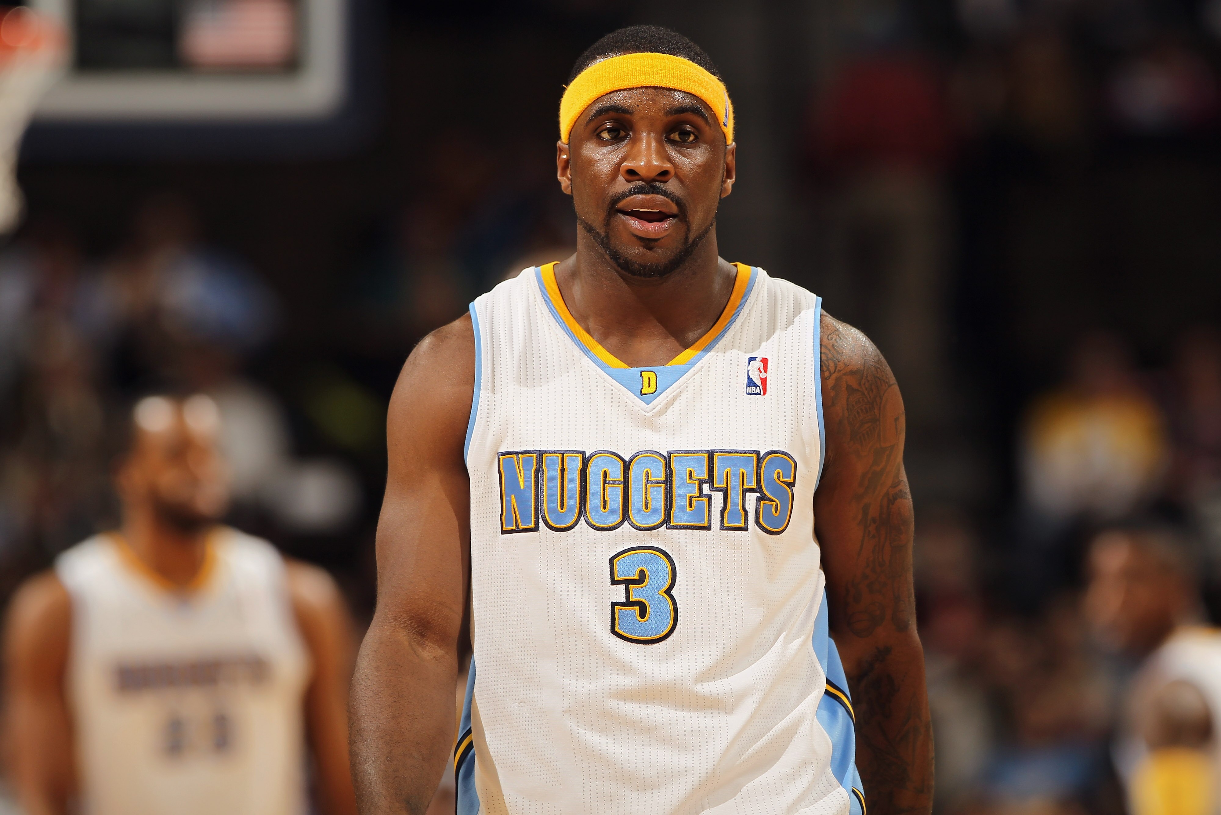 DENVER, CO - JANUARY 13:  Ty Lawson #3 of the Denver Nuggets looks on during a break in the action against the Miami Heat at the Pepsi Center on January 13, 2011 in Denver, Colorado. The Nuggets defeated the Heat 130-102. NOTE TO USER: User expressly ackn