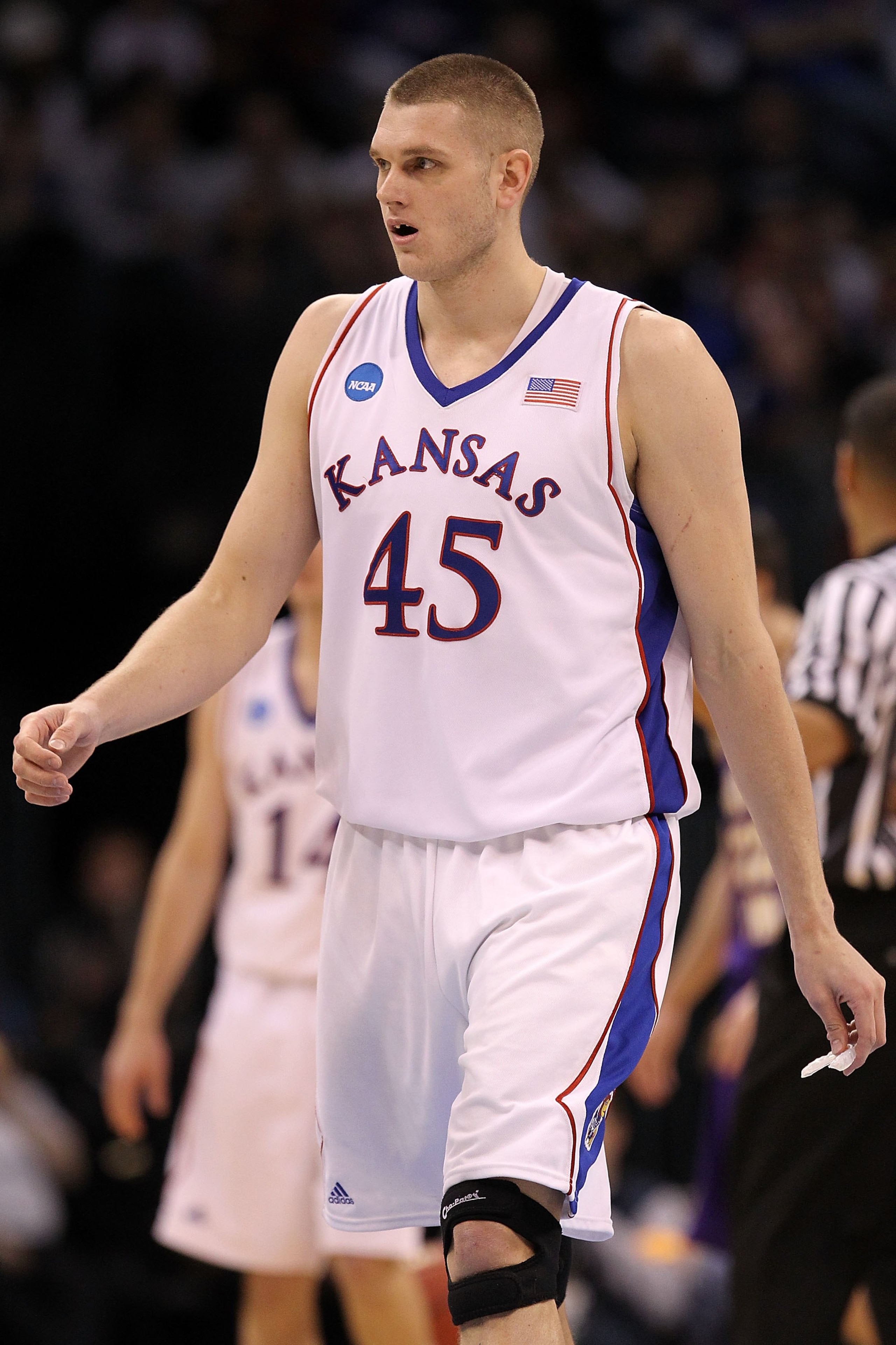 OKLAHOMA CITY - MARCH 20: Cole Aldrich #45 of the Kansas Jayhawks looks on against the Northern Iowa Panthers during the second round of the 2010 NCAA men's basketball tournament at Ford Center on March 20, 2010 in Oklahoma City, Oklahoma. (Photo by Ron OKLAHOMA CITY - MARCH 20: Cole Aldrich #45 of the Kansas Jayhawks looks on against the Northern Iowa Panthers during the second round of the 2010 NCAA men's basketball tournament at Ford Center on March 20, 2010 in Oklahoma City, Oklahoma. (Photo by Ron