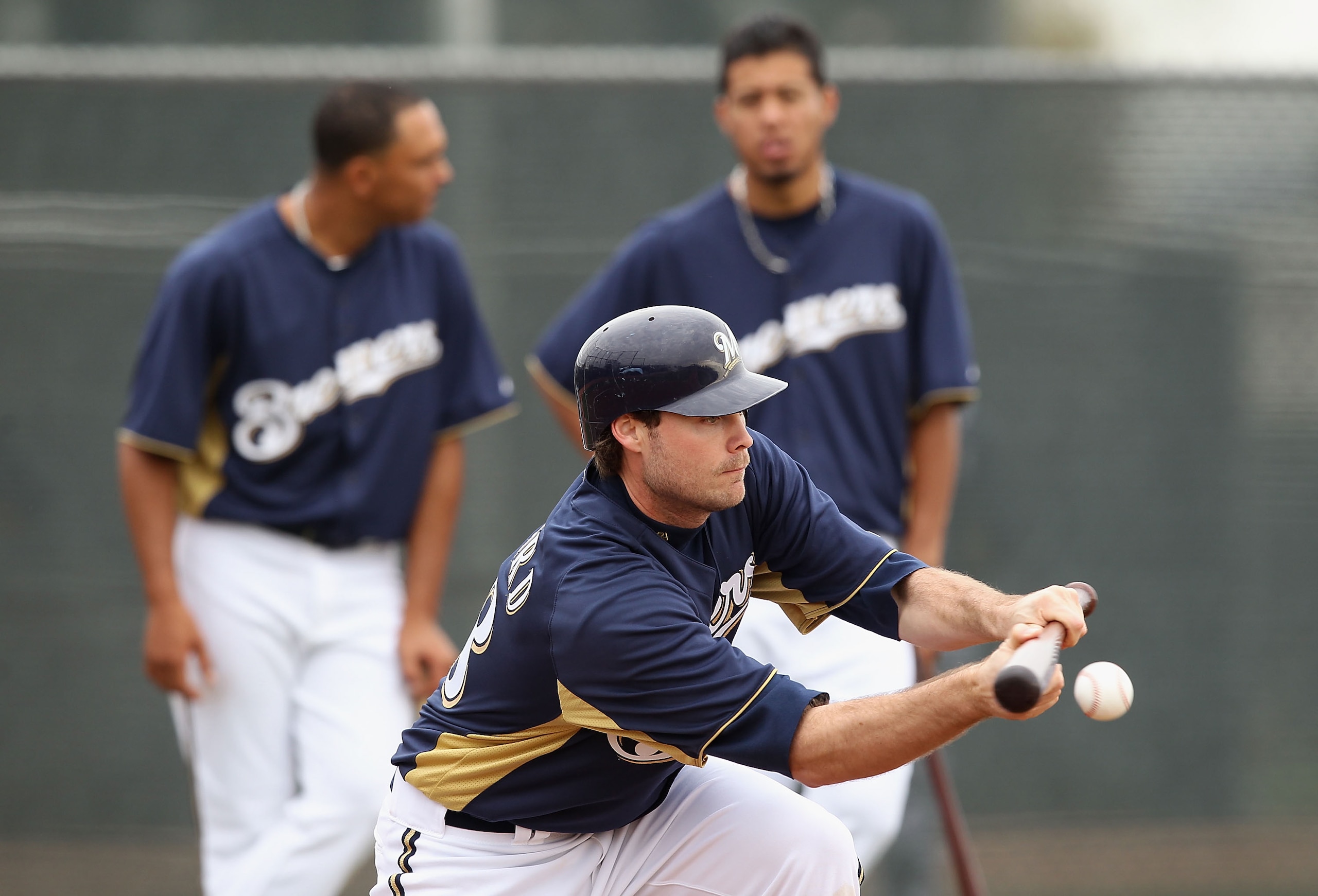 PHOENIX, AZ - FEBRUARY 18:  Pitcher Tim Dillard #48 of the Milwaukee Brewers participates in bunting drills during a MLB spring training practice at Maryvale Baseball Park on February 18, 2011 in Phoenix, Arizona.  (Photo by Christian Petersen/Getty Image
