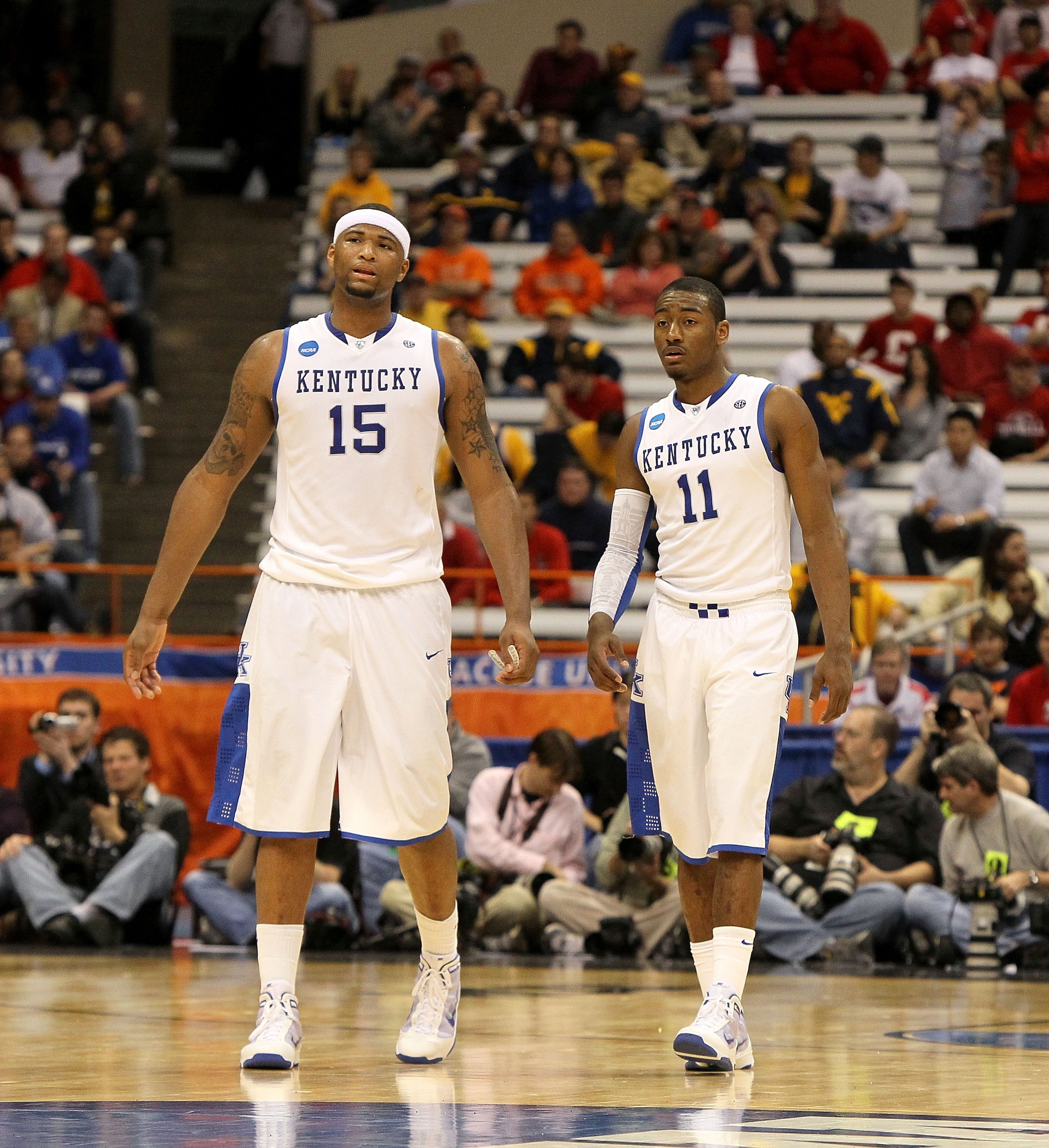 SYRACUSE, NY - MARCH 25: (L-R) DeMarcus Cousins #15 and John Wall #11 of the Kentucky Wildcats look on against the Cornell Big Red during the east regional semifinal of the 2010 NCAA men's basketball tournament at the Carrier Dome on March 25, 2010 in S SYRACUSE, NY - MARCH 25: (L-R) DeMarcus Cousins #15 and John Wall #11 of the Kentucky Wildcats look on against the Cornell Big Red during the east regional semifinal of the 2010 NCAA men's basketball tournament at the Carrier Dome on March 25, 2010 in S