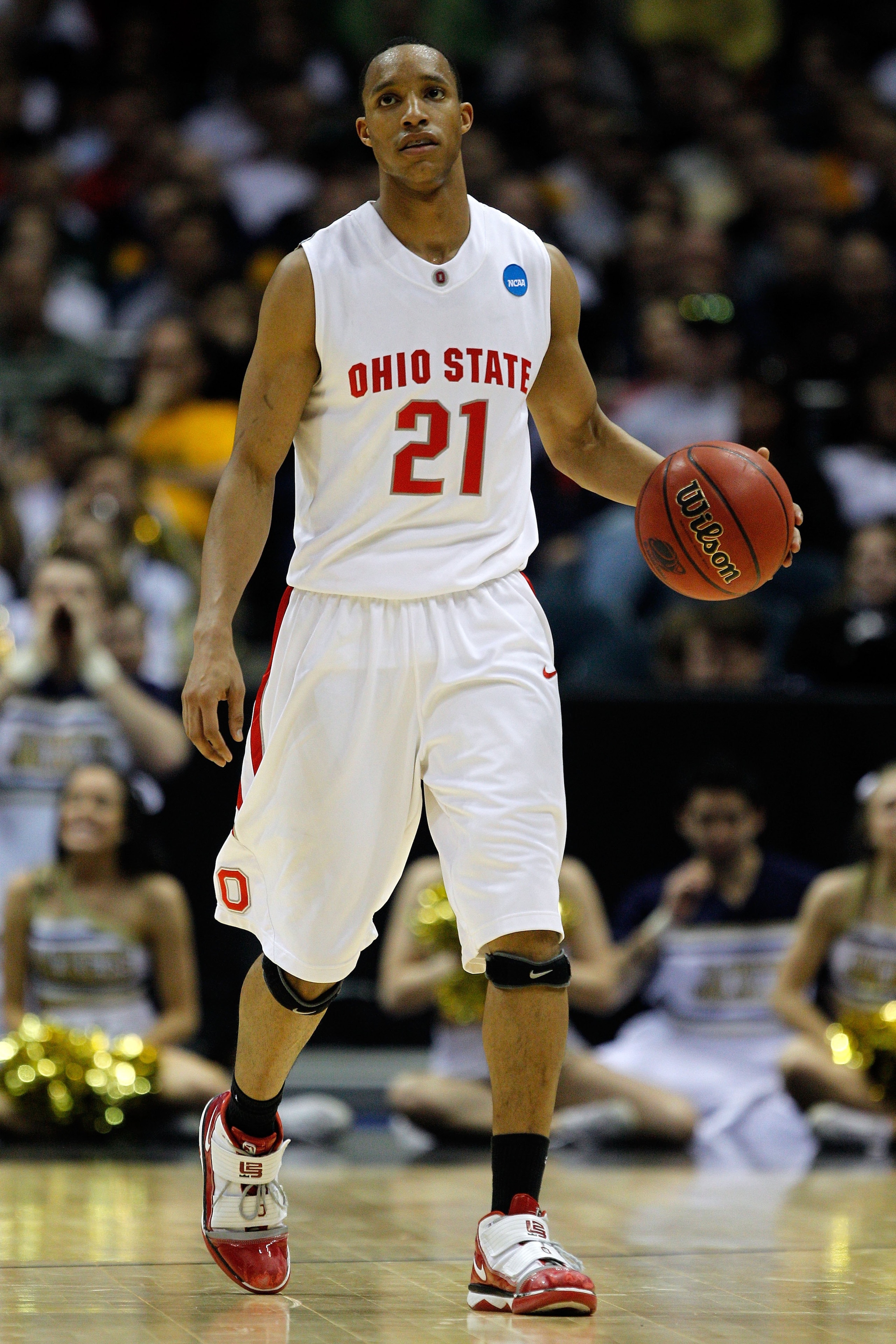 MILWAUKEE - MARCH 21: Evan Turner #21 of the Ohio State Buckeyes moves the ball in the second half while taking on the Georgia Tech Yellow Jackets during the second round of the 2010 NCAA men's basketball tournament at the Bradley Center on March 21, 201 MILWAUKEE - MARCH 21: Evan Turner #21 of the Ohio State Buckeyes moves the ball in the second half while taking on the Georgia Tech Yellow Jackets during the second round of the 2010 NCAA men's basketball tournament at the Bradley Center on March 21, 201