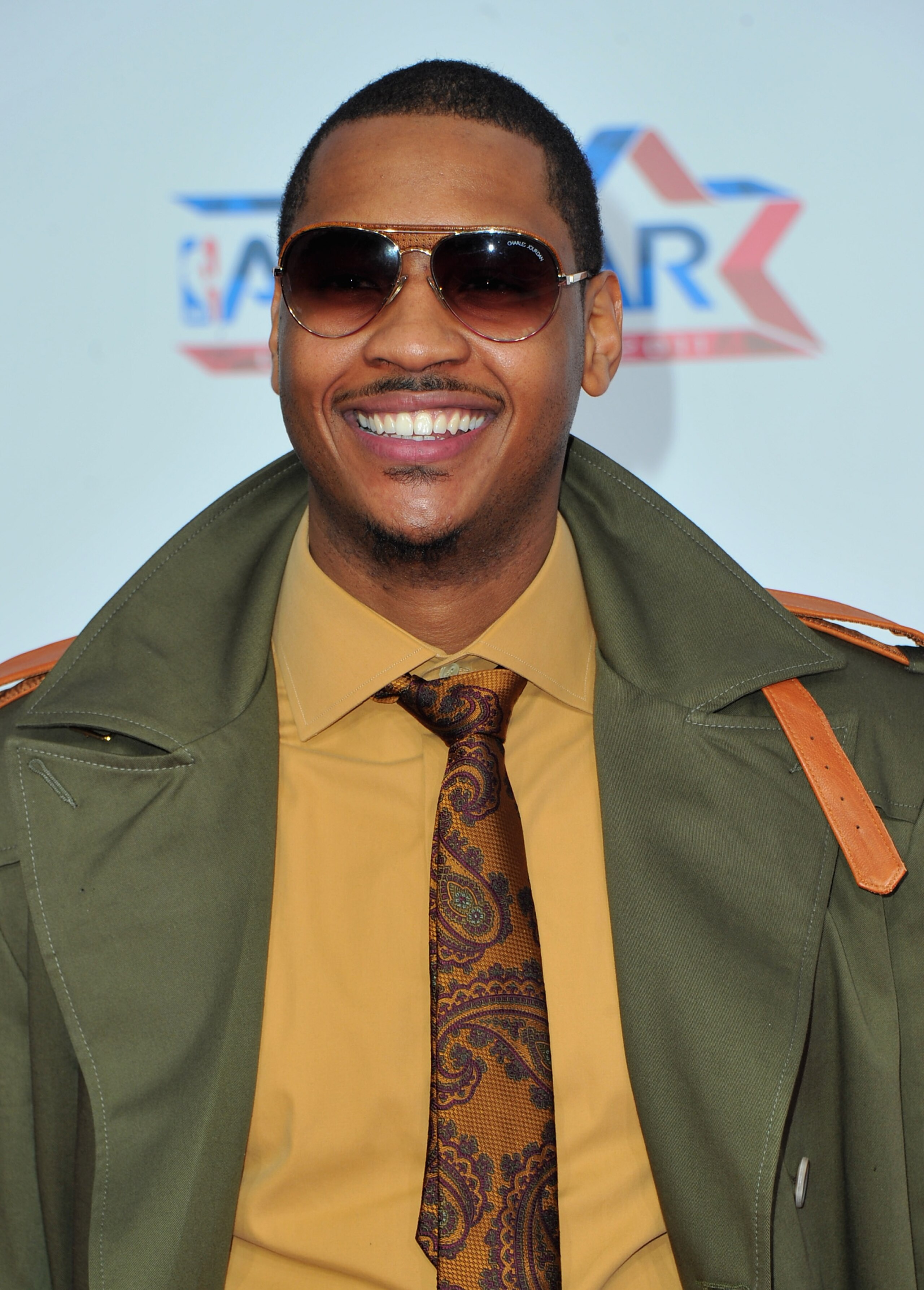 LOS ANGELES, CA - FEBRUARY 20:  NBA player Carmelo Anthony arrives to the T-Mobile Magenta Carpet at the 2011 NBA All-Star Game on February 20, 2011 in Los Angeles, California.  (Photo by Alberto E. Rodriguez/Getty Images)