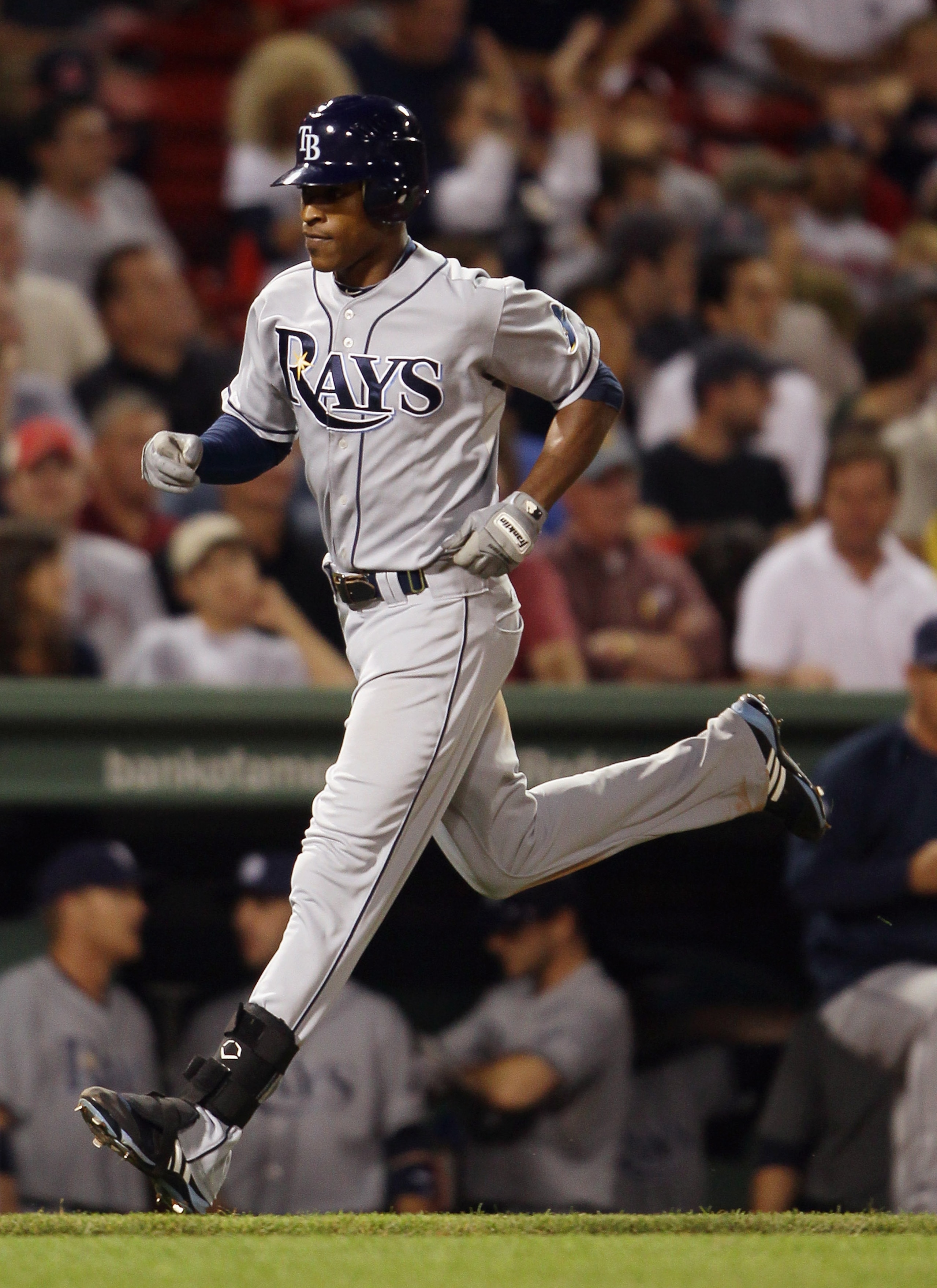 BOSTON - SEPTEMBER 07:  B.J. Upton #2 of the Tampa Bay Rays heads for home after he hit a solo home run in the sixth inning against the Boston Red Sox on September 7, 2010 at Fenway Park in Boston, Massachusetts.  (Photo by Elsa/Getty Images)