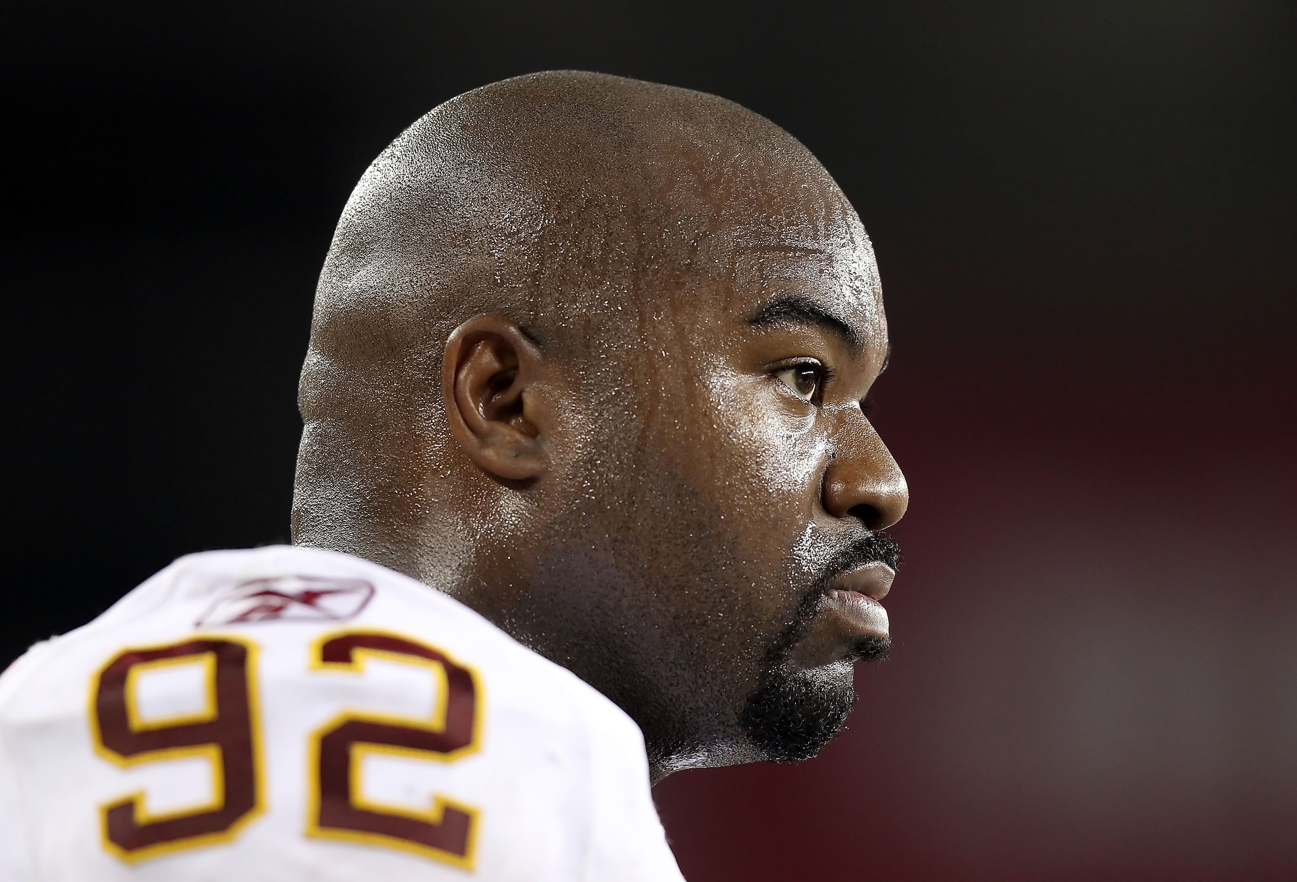 GLENDALE, AZ - SEPTEMBER 02:  Defensive tackle Albert Haynesworth #92 of the Washington Redskins stands on the sidelines during preseason NFL game against the Arizona Cardinals at the University of Phoenix Stadium on September 2, 2010 in Glendale, Arizona