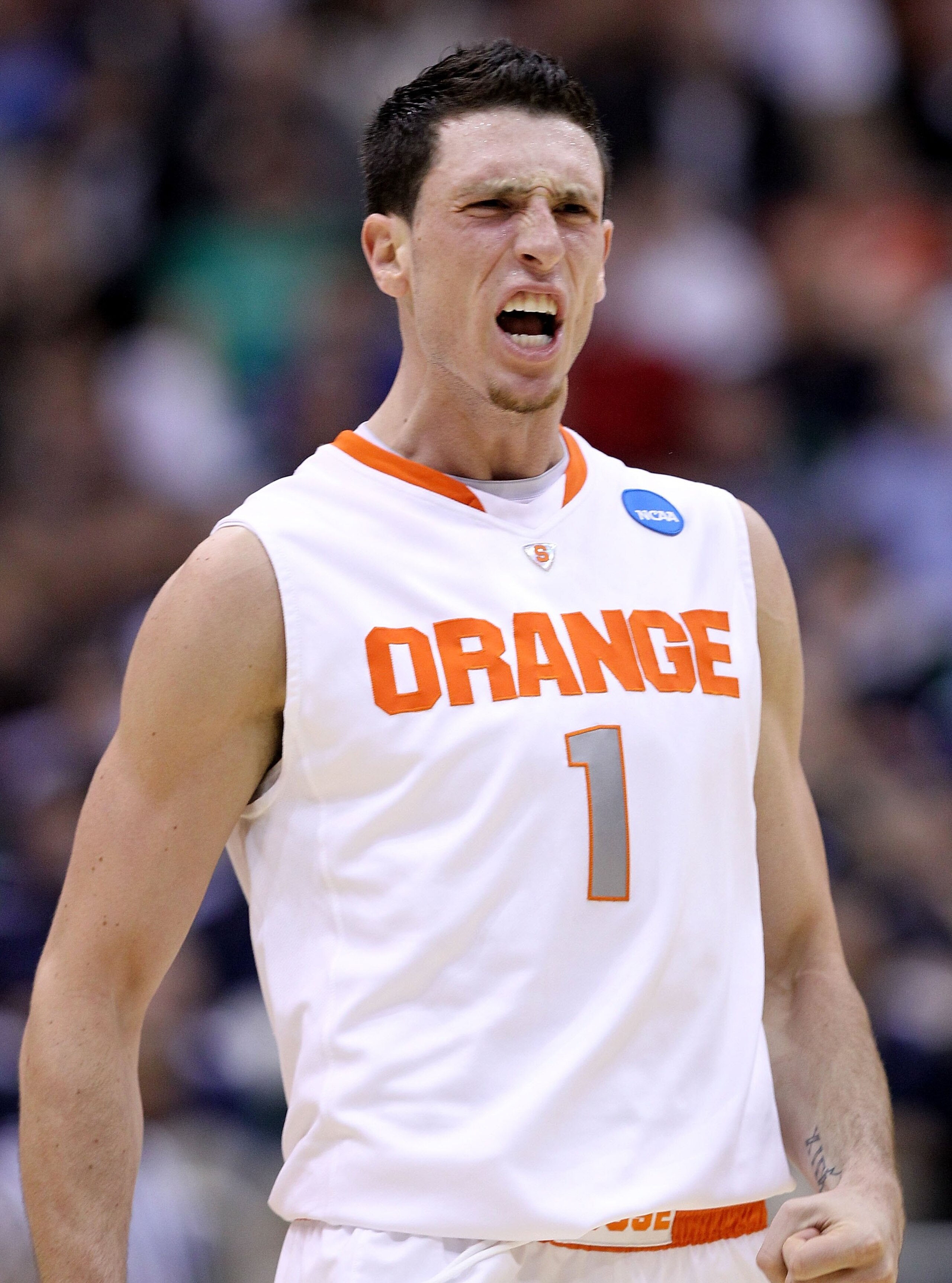 SALT LAKE CITY - MARCH 25:  Andy Rautins #1 of the Syracuse Orange yells against the Butler Bulldogs during the west regional semifinal of the 2010 NCAA men's basketball tournament at the Energy Solutions Arena on March 25, 2010 in Salt Lake City, Utah.