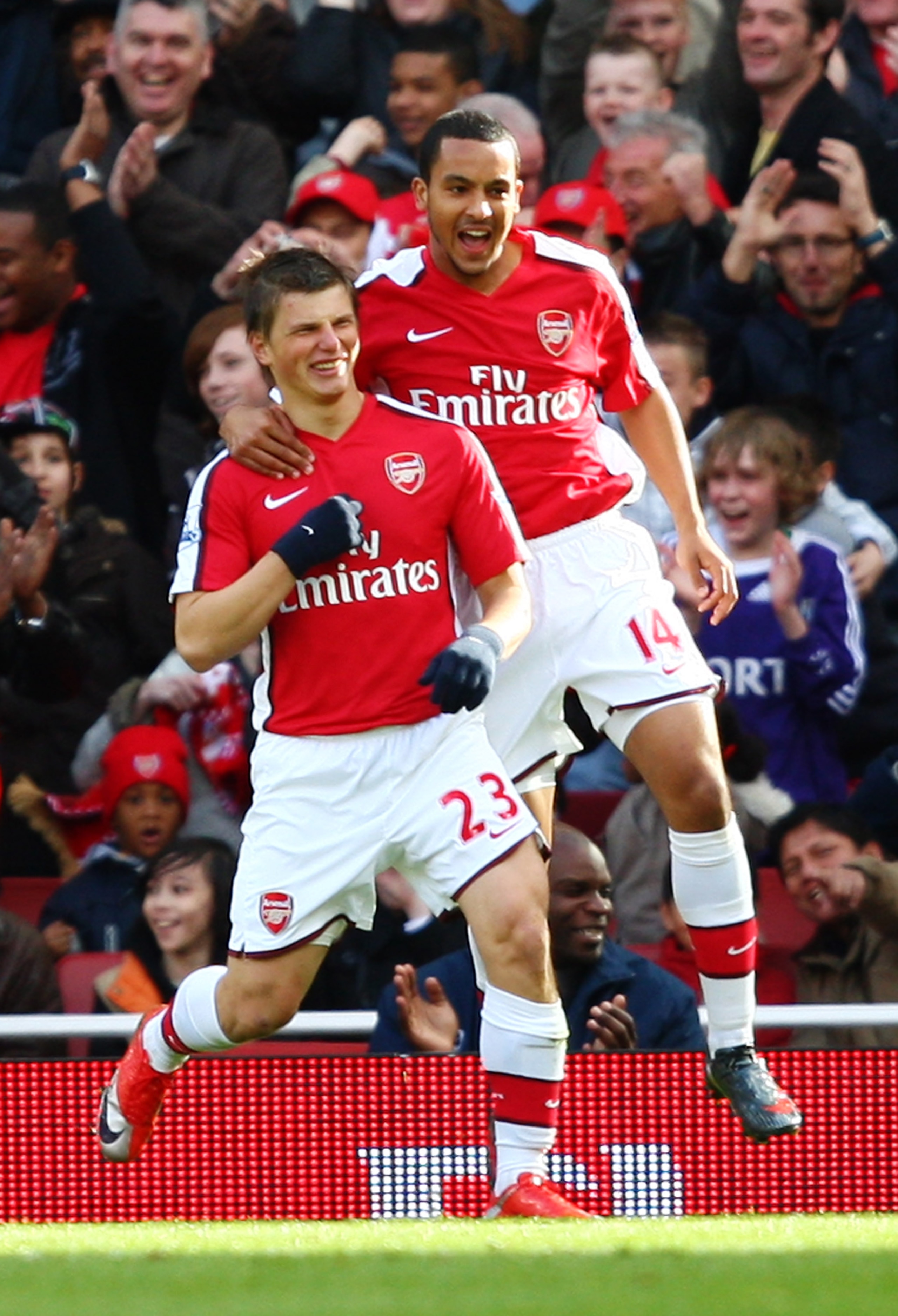 LONDON - MARCH 14: Andrei Arshavin and Theo Walcott of Arsenal celebrate their team's first goal scored by Arshavin during the Barclays Premier League match between Arsenal and Blackburn Rovers at Emirates Stadium on March 14, 2009 in London, England. (P LONDON - MARCH 14: Andrei Arshavin and Theo Walcott of Arsenal celebrate their team's first goal scored by Arshavin during the Barclays Premier League match between Arsenal and Blackburn Rovers at Emirates Stadium on March 14, 2009 in London, England. (P