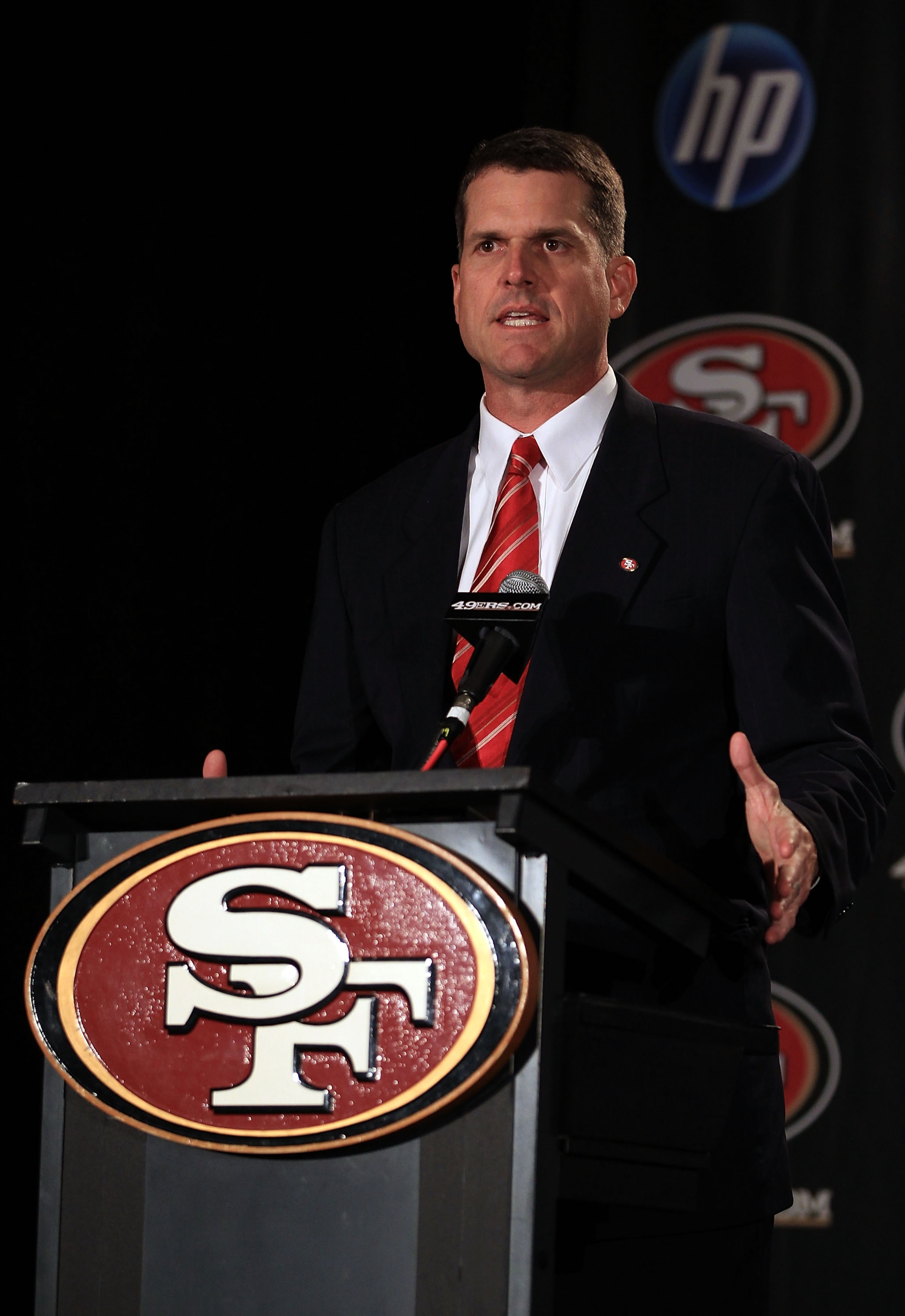 SAN FRANCISCO, CA - JANUARY 07: Jim Harbaugh speaks at a press conference where he was introduced as the new San Francisco 49ers head coach at the Palace Hotel on January 7, 2011 in San Francisco, California. (Photo by Ezra Shaw/Getty Images) SAN FRANCISCO, CA - JANUARY 07: Jim Harbaugh speaks at a press conference where he was introduced as the new San Francisco 49ers head coach at the Palace Hotel on January 7, 2011 in San Francisco, California. (Photo by Ezra Shaw/Getty Images)
