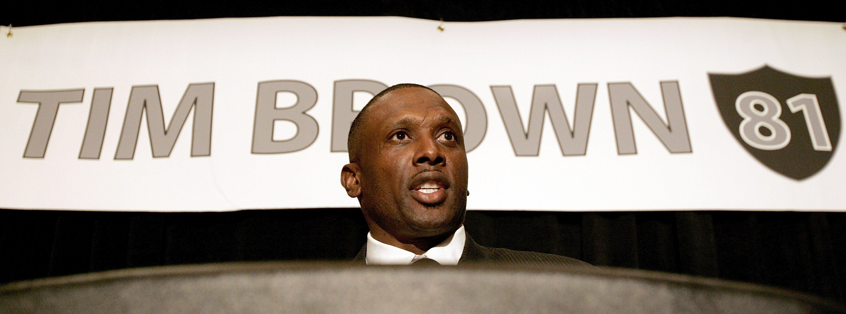 OAKLAND, CA - JULY 18:  Tim Brown announces his retirement from professional football after signing a one day contract with the Oakland Raiders, whom he played most of his career with, during a press conference at the Grand Ballroom of the Oakland Airport