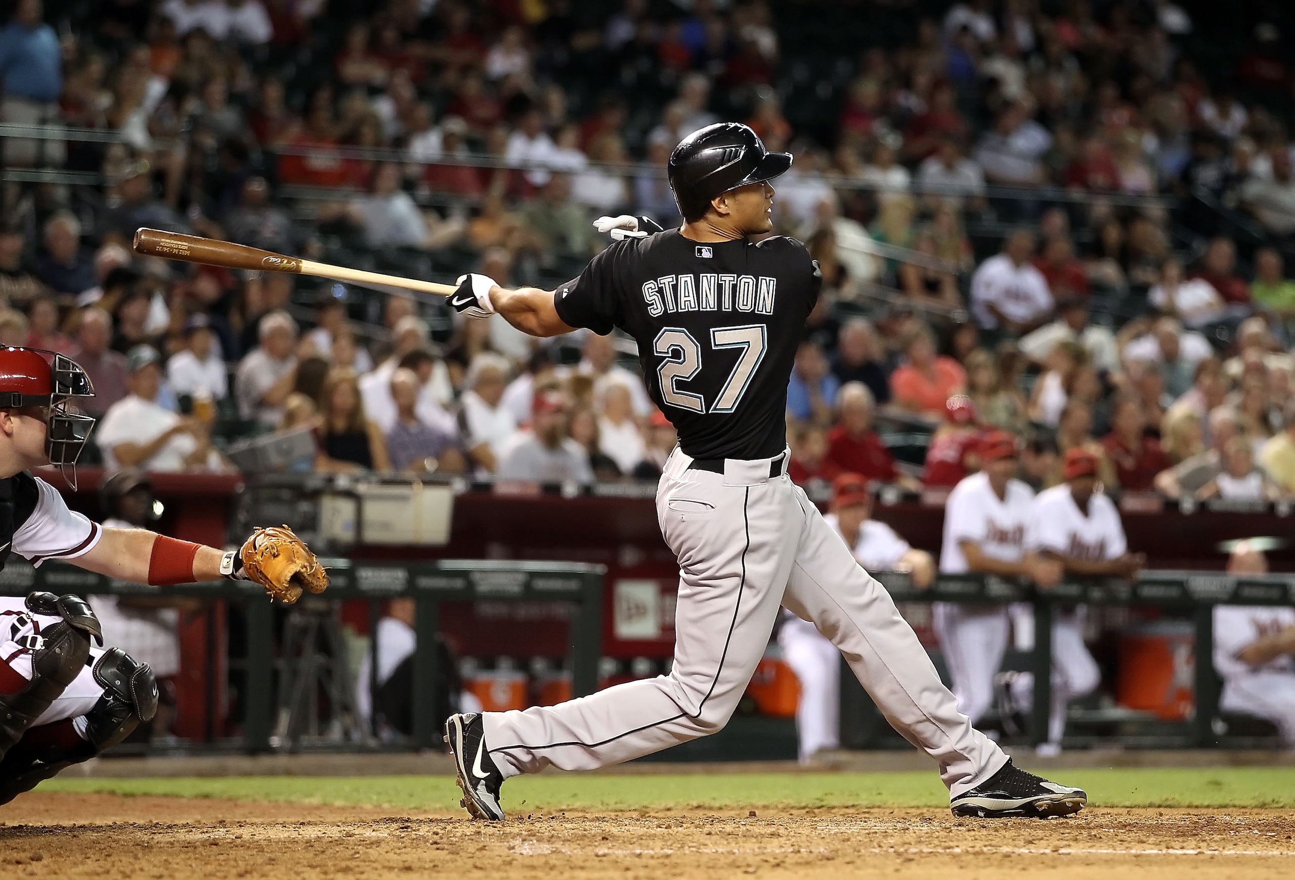 PHOENIX - JULY 08: Mike Stanton #27 of the Florida Marlins bats against the Arizona Diamondbacks during the Major League Baseball game at Chase Field on July 8, 2010 in Phoenix, Arizona. The Diamondbacks defeated the Marlins 10-4. (Photo by Christian Pe PHOENIX - JULY 08: Mike Stanton #27 of the Florida Marlins bats against the Arizona Diamondbacks during the Major League Baseball game at Chase Field on July 8, 2010 in Phoenix, Arizona. The Diamondbacks defeated the Marlins 10-4. (Photo by Christian Pe