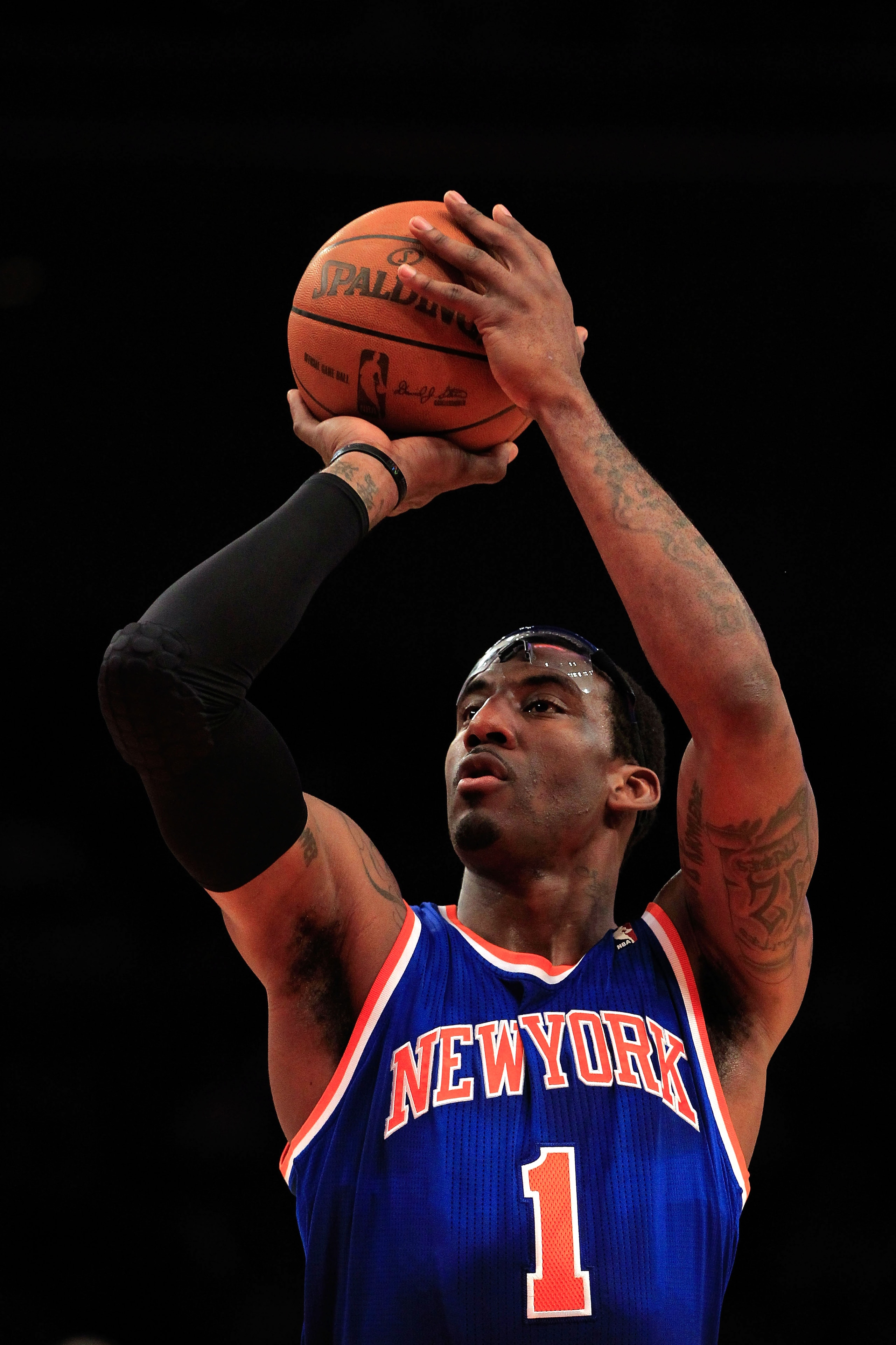 NEW YORK, NY - FEBRUARY 16:  Amar'e Stoudemire #1 of the New York Knicks shoots a free throw against the Atlanta Hawks at Madison Square Garden on February 16, 2011 in New York City. NOTE TO USER: User expressly acknowledges and agrees that, by downloadin