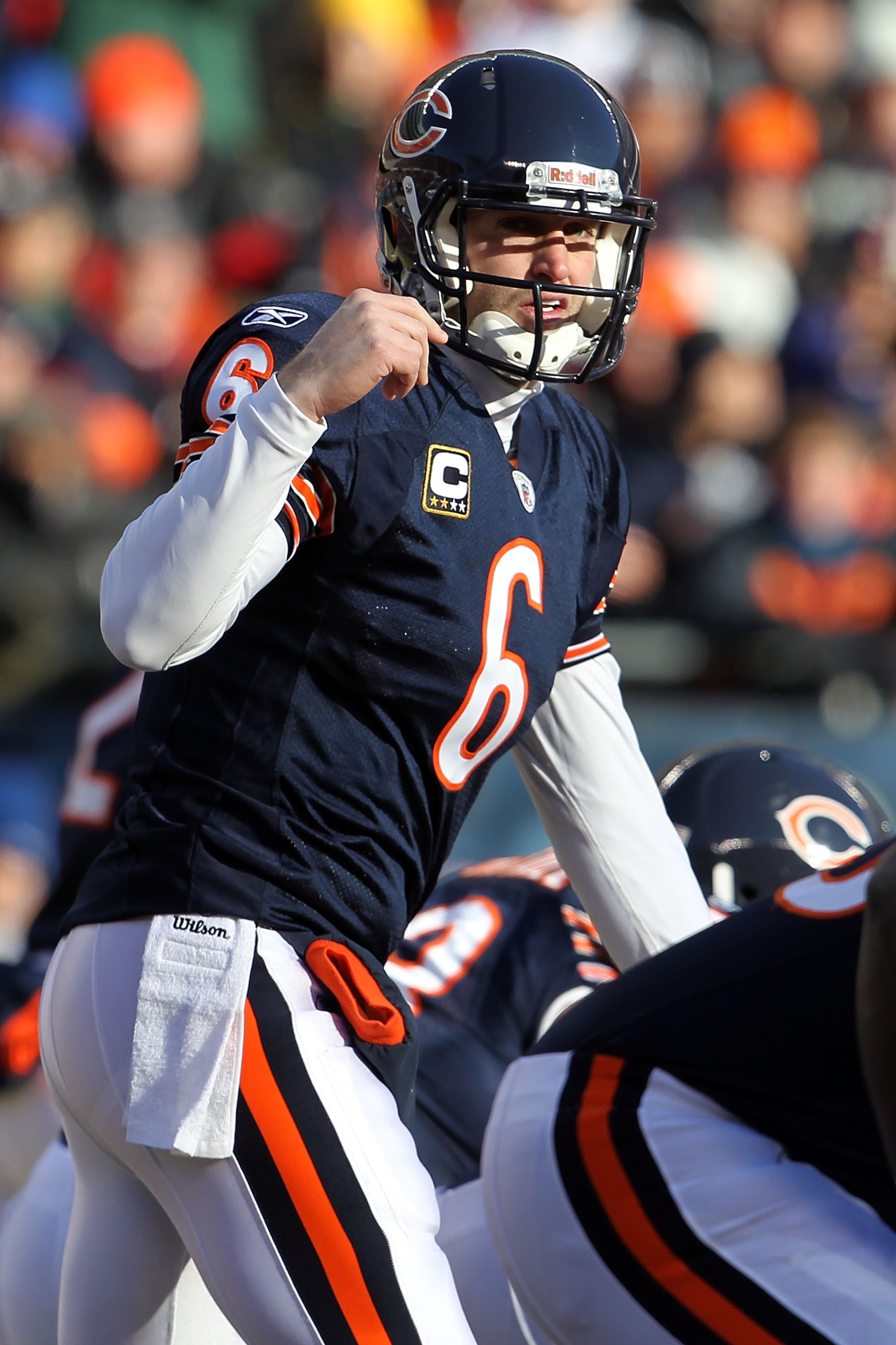 CHICAGO, IL - JANUARY 23:  Quarterback Jay Cutler #6 of the Chicago Bears under center while taking on the Green Bay Packers in the NFC Championship Game at Soldier Field on January 23, 2011 in Chicago, Illinois.  (Photo by Jamie Squire/Getty Images)