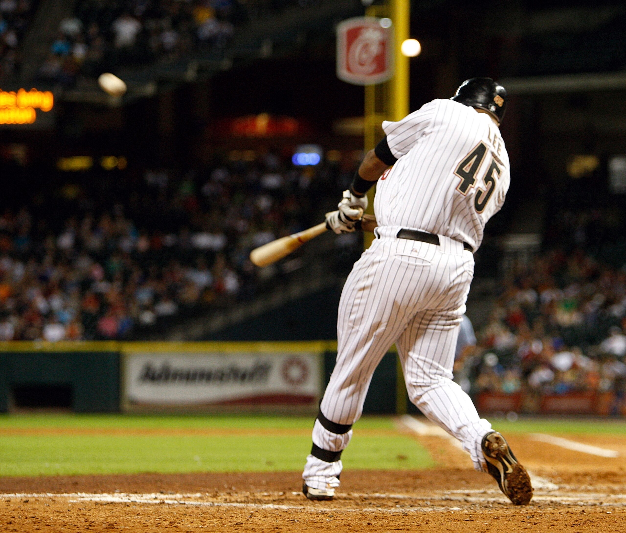 HOUSTON - AUGUST 19: Carlos Lee #45 of the Houston Astros hits a three run home run in the seventh inning off Pat Misch of the New York Mets at Minute Maid Park on August 19, 2010 in Houston, Texas. (Photo by Bob Levey/Getty Images) HOUSTON - AUGUST 19: Carlos Lee #45 of the Houston Astros hits a three run home run in the seventh inning off Pat Misch of the New York Mets at Minute Maid Park on August 19, 2010 in Houston, Texas. (Photo by Bob Levey/Getty Images)