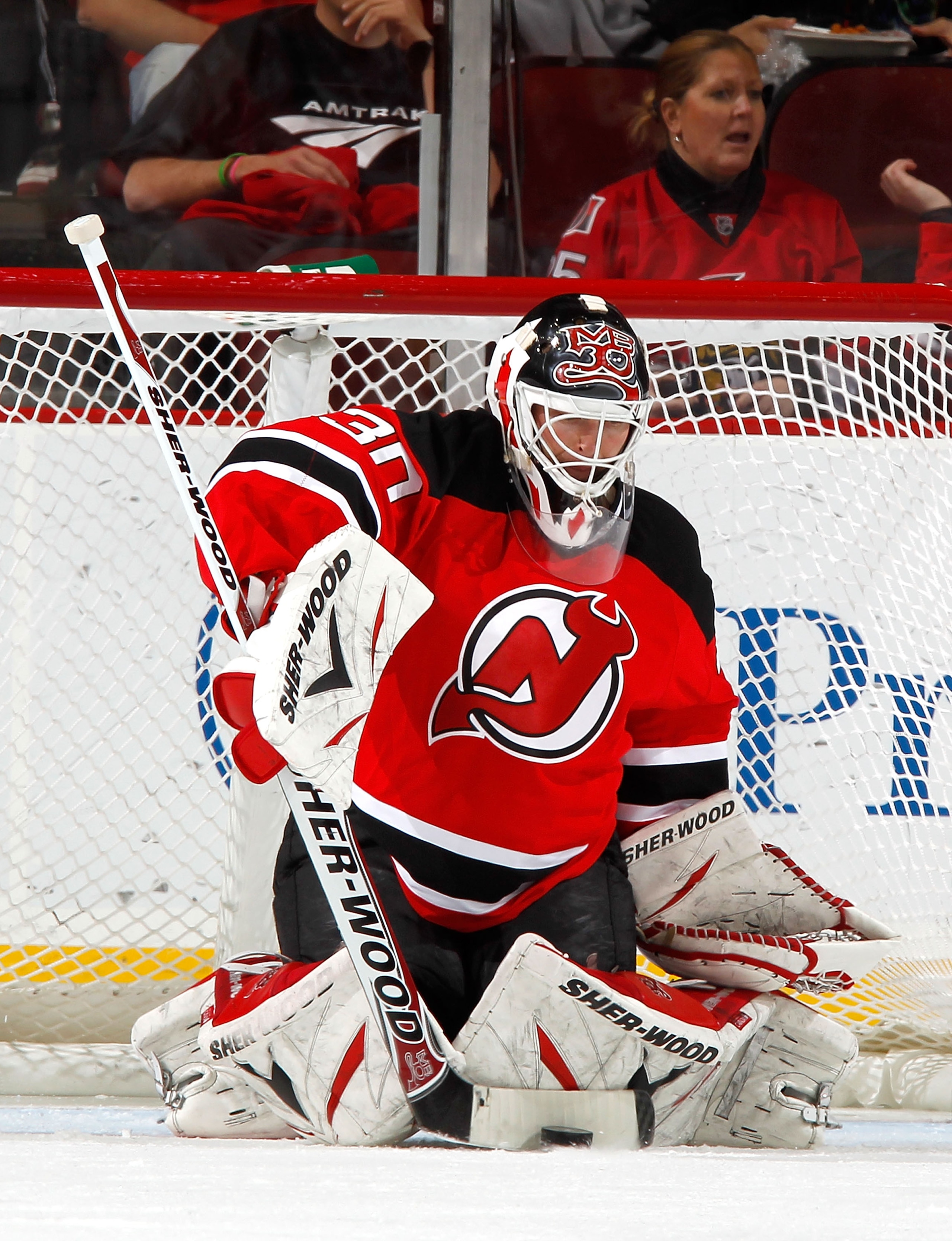 NEWARK, NJ - FEBRUARY 01:  Goalie Martin Brodeur #30 of the New Jersey Devils makes a save during an NHL hockey game against the Ottawa Senators at the Prudential Center on February 1, 2011 in Newark, New Jersey.  (Photo by Paul Bereswill/Getty Images)