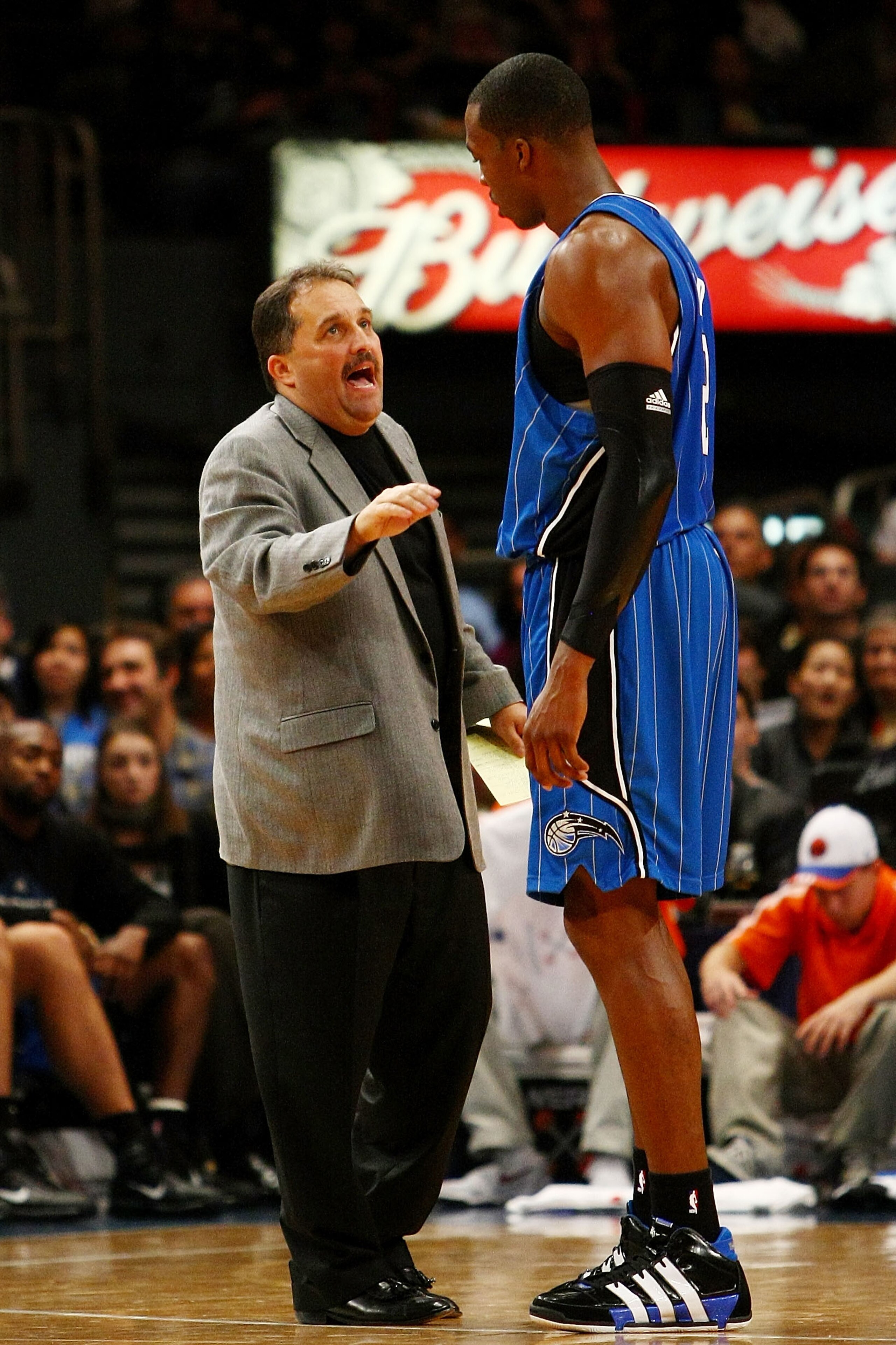 NEW YORK - NOVEMBER 29:  Dwight Howard #12 of the Orlando Magic talks with head coach Stan Van Gundy during a time out against the New York Knicks at Madison Square Garden November 29, 2009 in New York City. NOTE TO USER: User expressly acknowledges and a