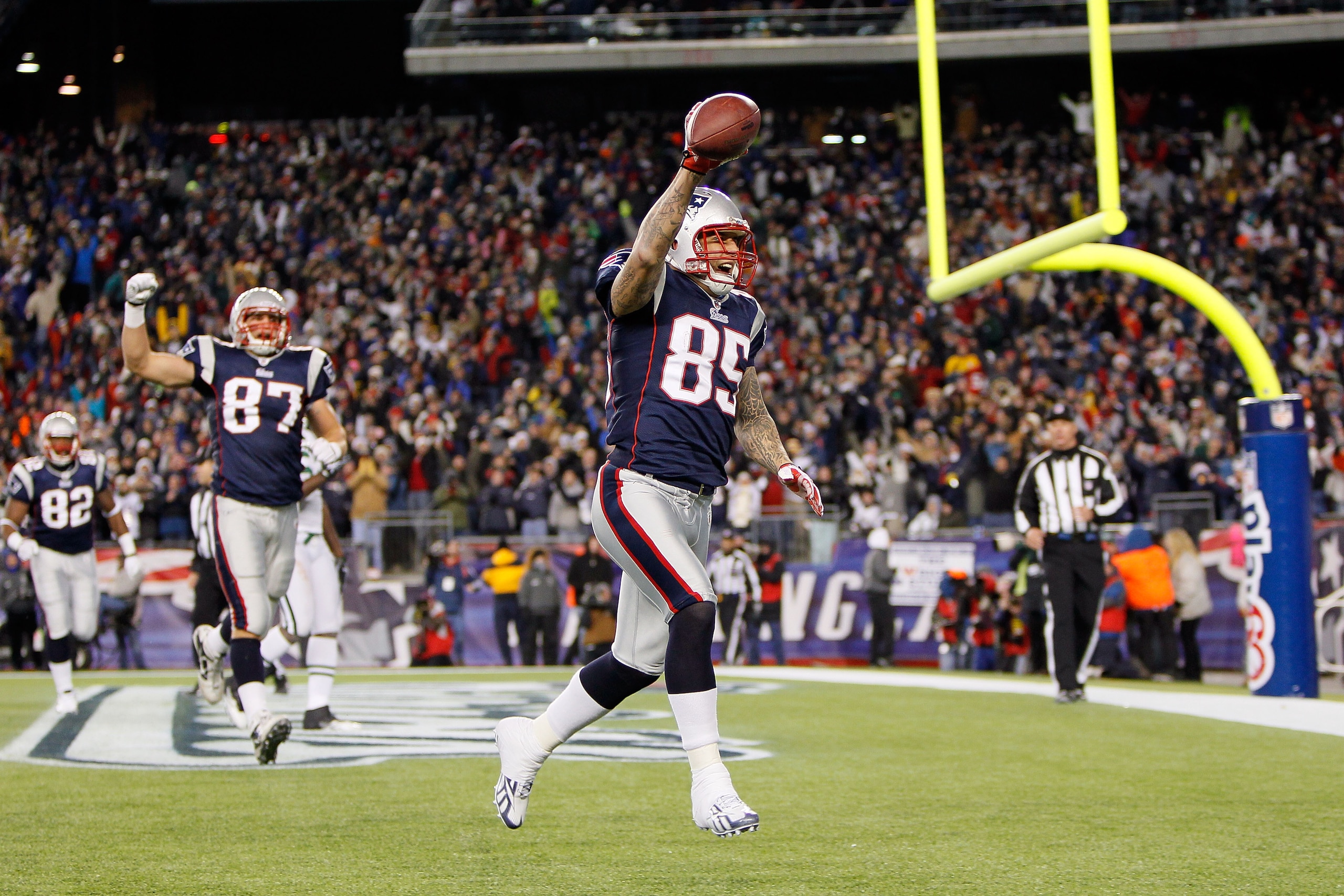 FOXBORO, MA - DECEMBER 06: Aaron Hernandez #85 of the New England Patriots scores a 1-yard touchdown reception in the fourth quarter against the New York Jets at Gillette Stadium on December 6, 2010 in Foxboro, Massachusetts. (Photo by Jim Rogash/Getty FOXBORO, MA - DECEMBER 06: Aaron Hernandez #85 of the New England Patriots scores a 1-yard touchdown reception in the fourth quarter against the New York Jets at Gillette Stadium on December 6, 2010 in Foxboro, Massachusetts. (Photo by Jim Rogash/Getty