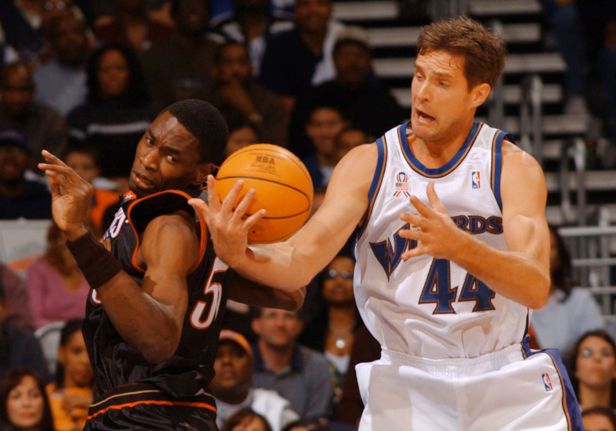 3 Nov 2001:  Christian Laettner #44 of the Washington Wizards collects a rebound from Dikembe Mutombo #55 of the Philadelphia 76ers during NBA action at the MCI Center in Washington DC.  DIGITAL IMAGE NOTE TO USER:  User expressly acknowledges and agrees